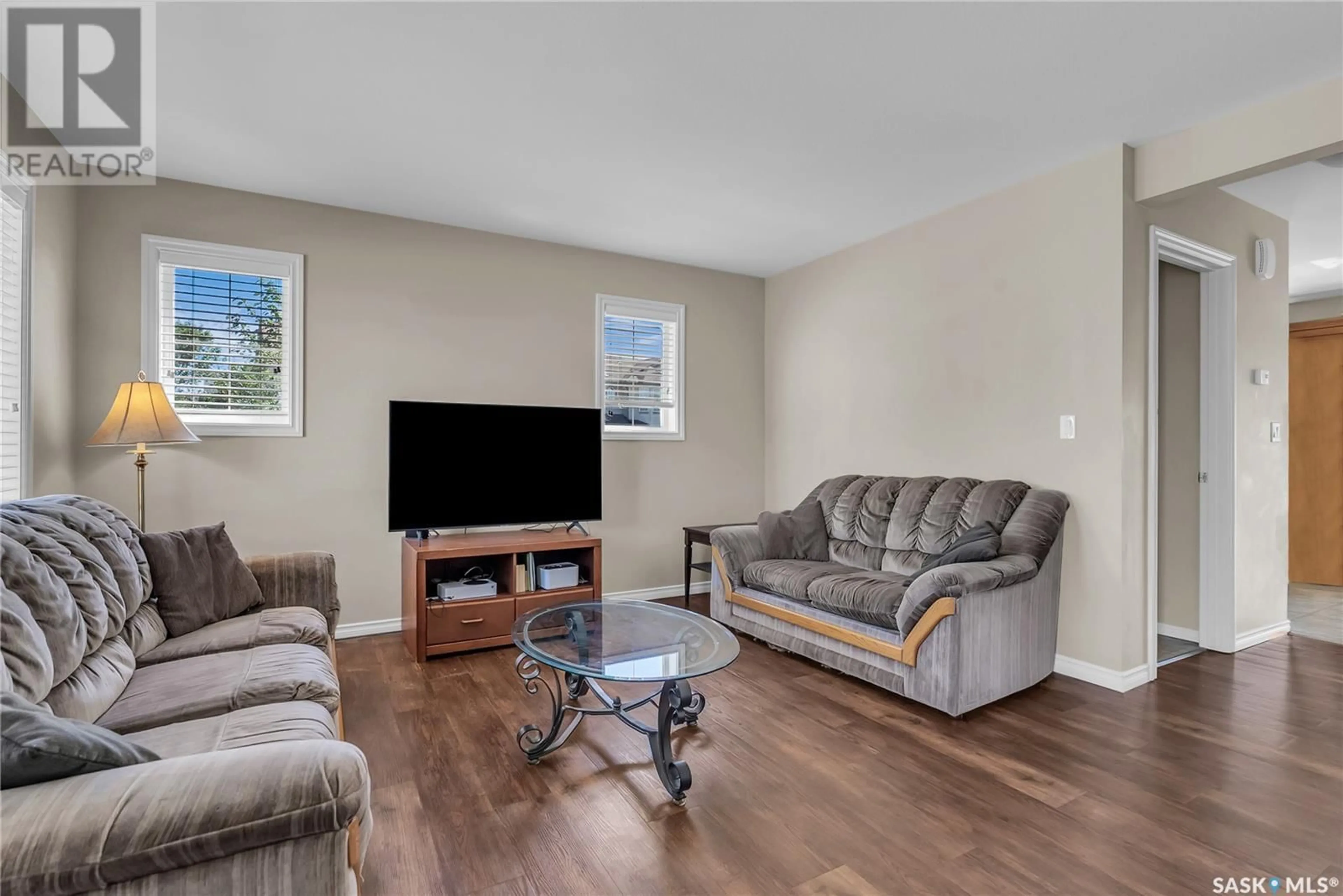 Living room with furniture, unknown for 303 - 305 SLIMMON PLACE, Saskatoon Saskatchewan S7V0A8