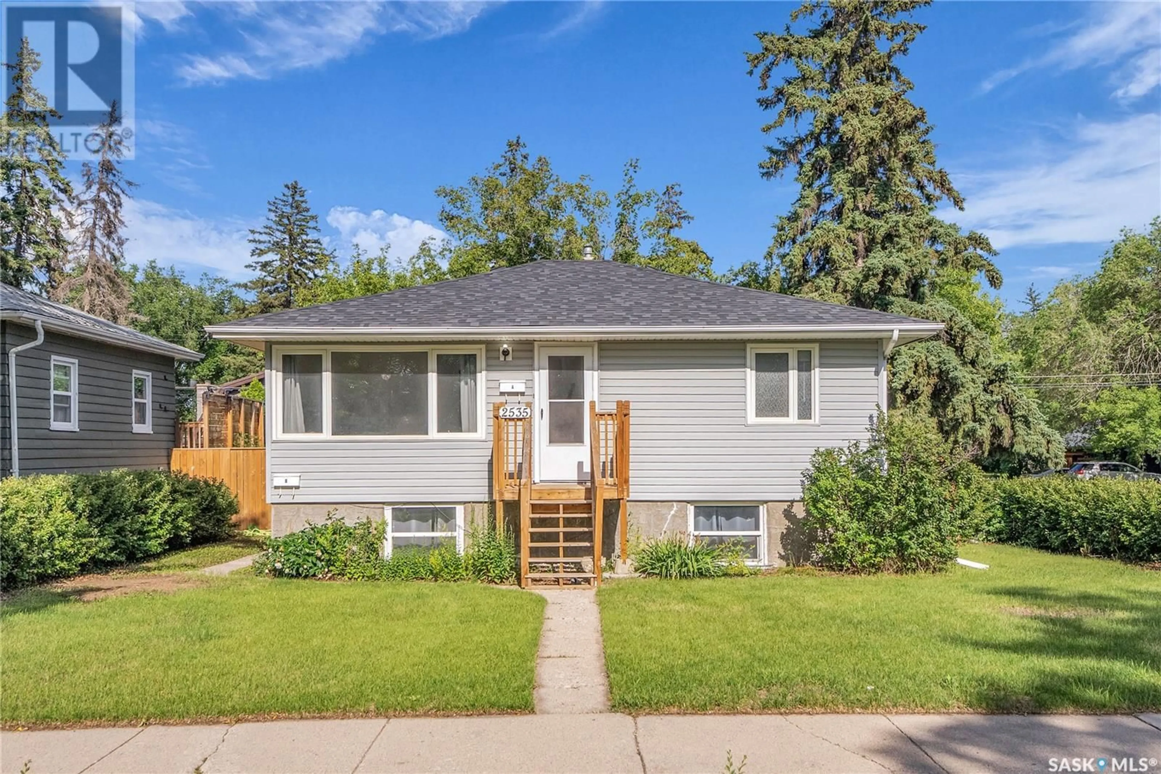 Home with vinyl exterior material, street for 2535 KELVIN AVENUE, Saskatoon Saskatchewan S7J0T6
