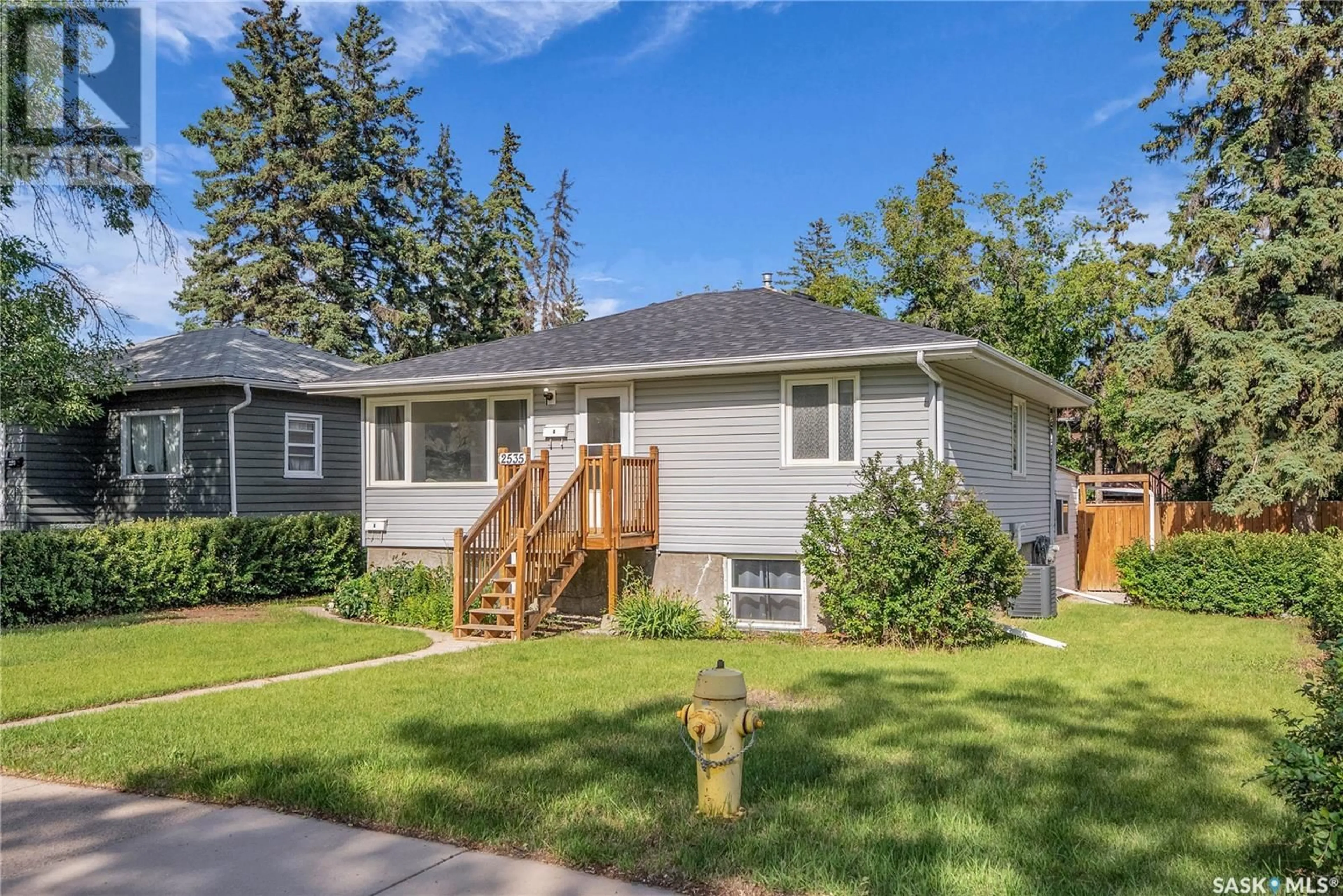 Home with vinyl exterior material, street for 2535 KELVIN AVENUE, Saskatoon Saskatchewan S7J0T6