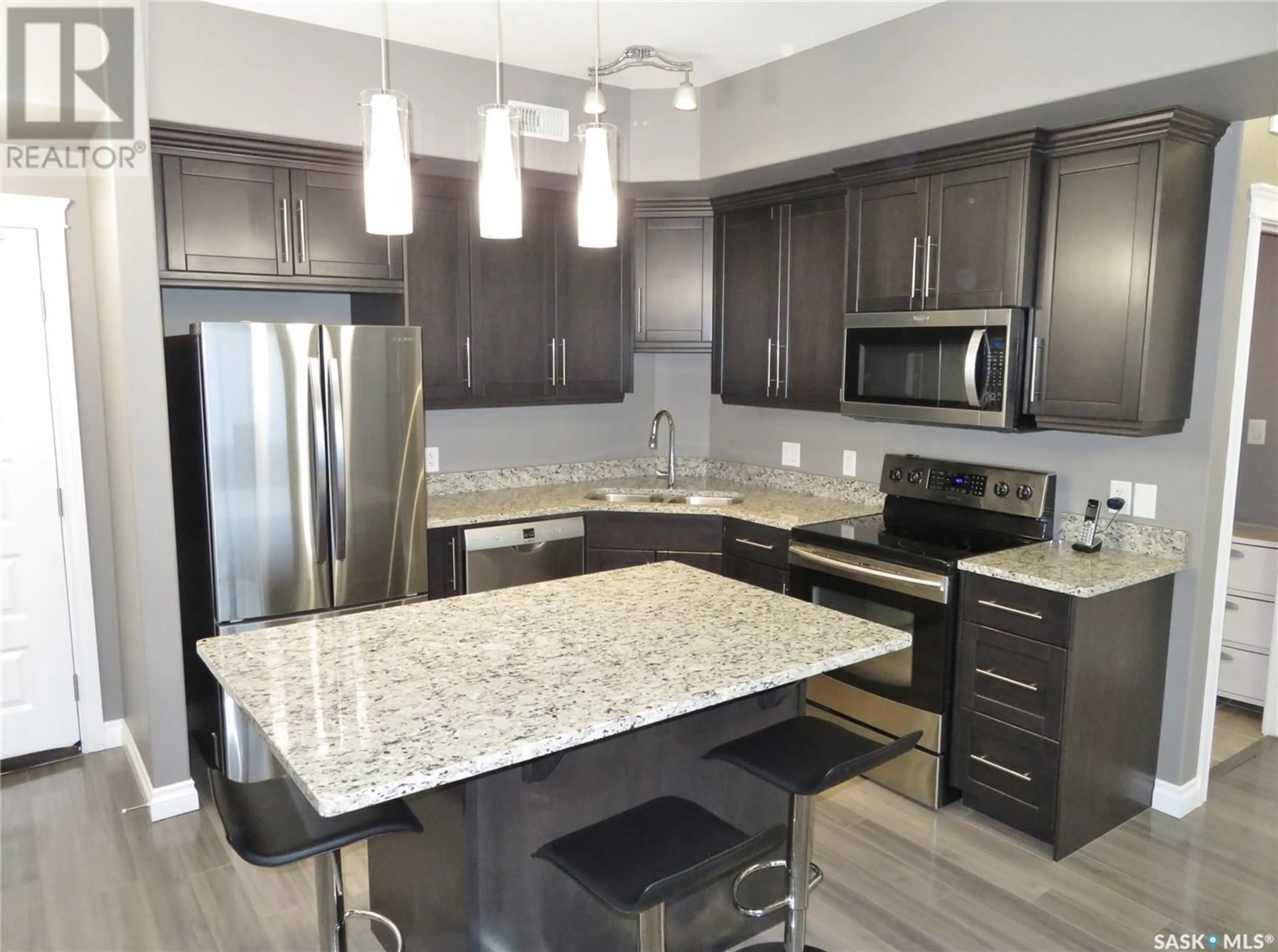 Open concept kitchen, unknown for 411 419 NELSON ROAD, Saskatoon Saskatchewan S7S1P2
