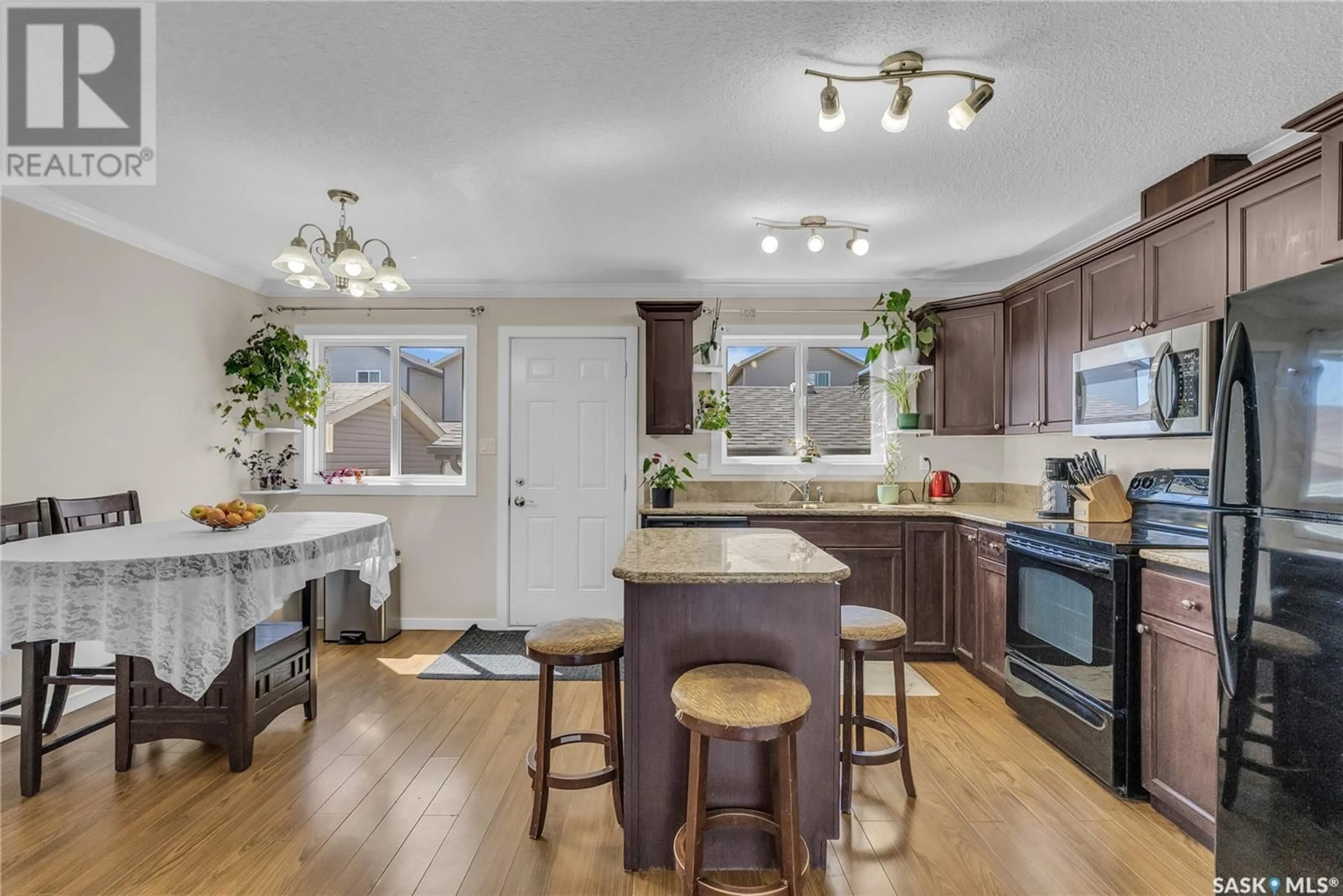 Open concept kitchen, unknown for 460 COAD MANOR, Saskatoon Saskatchewan S7R0K2