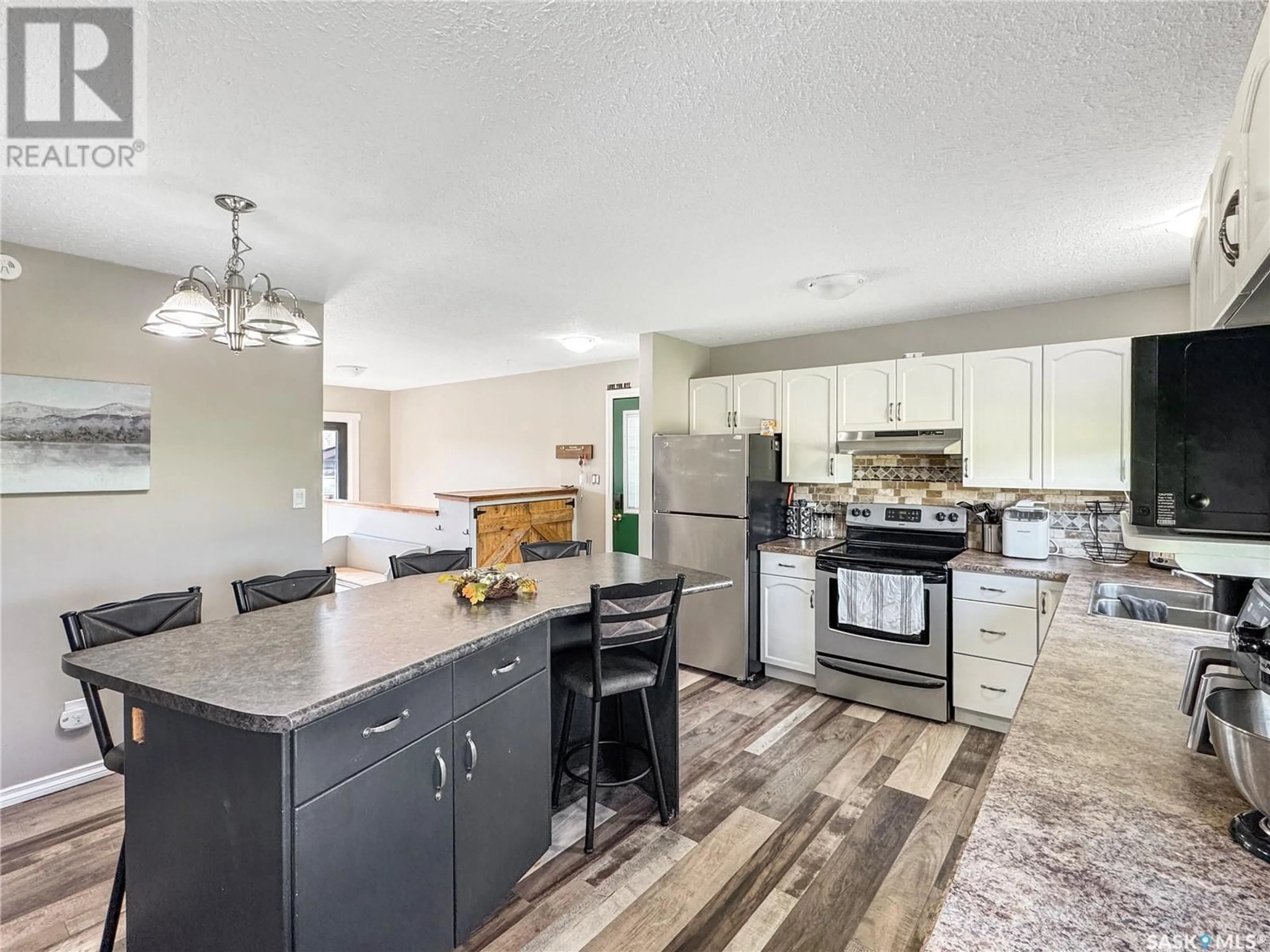 Open concept kitchen, unknown for 316 ORTON STREET, Cut Knife Saskatchewan S0M0N0