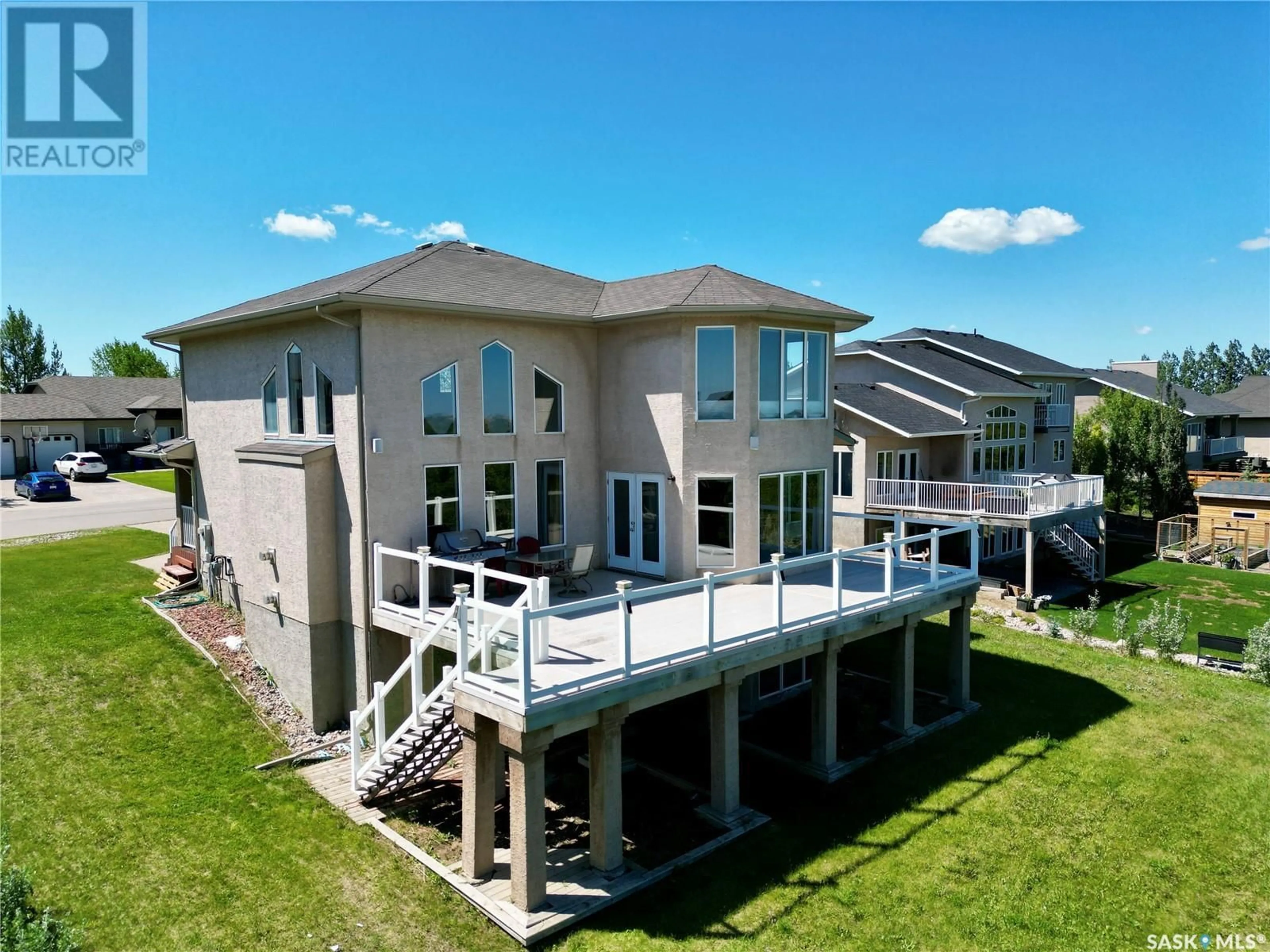 A pic from outside/outdoor area/front of a property/back of a property/a pic from drone, building for 40 ROSEWOOD DRIVE, Lumsden Saskatchewan S0G3C0