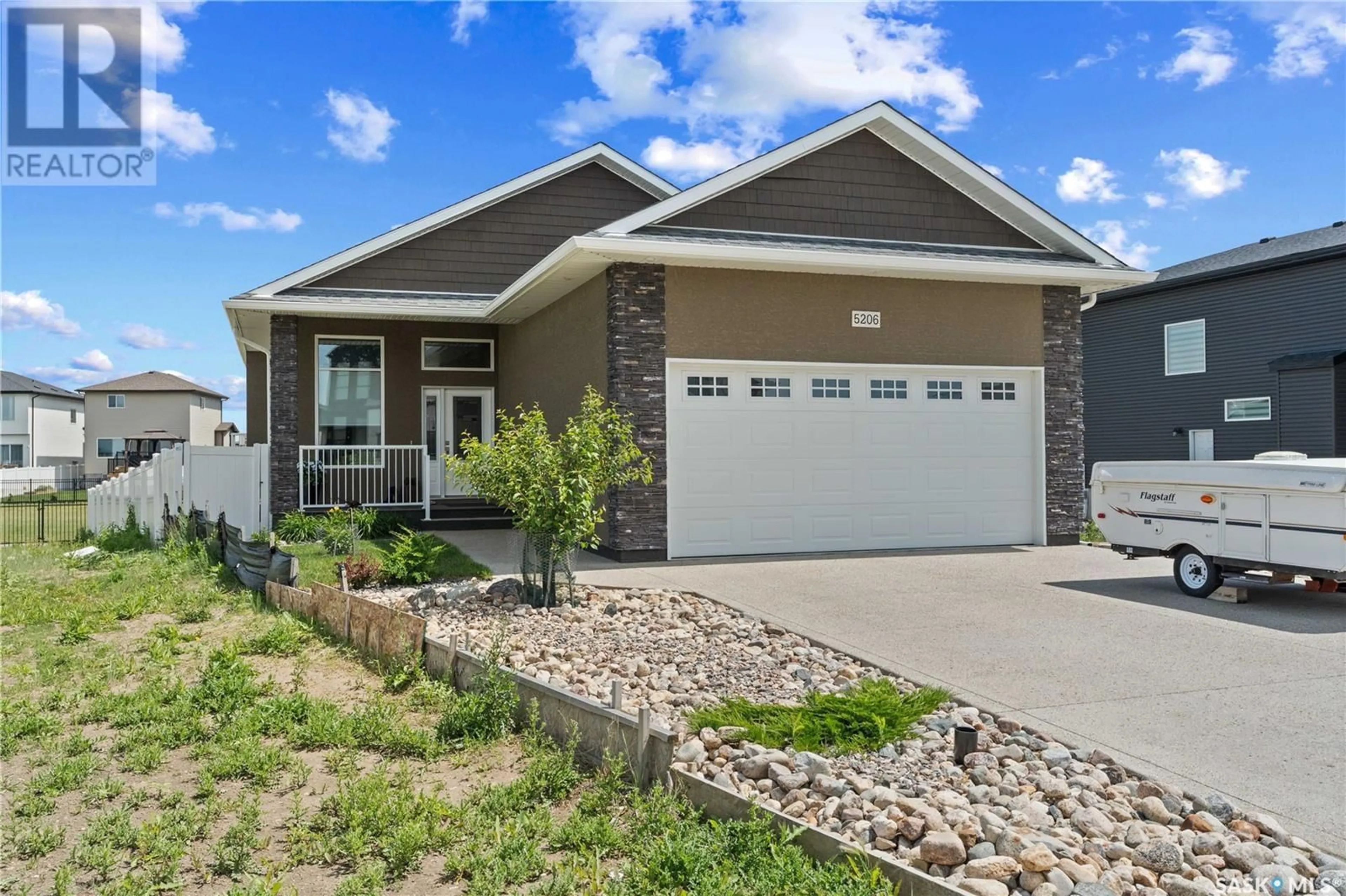 Home with vinyl exterior material, street for 5206 GREEN CRESCENT, Regina Saskatchewan S4V3S9