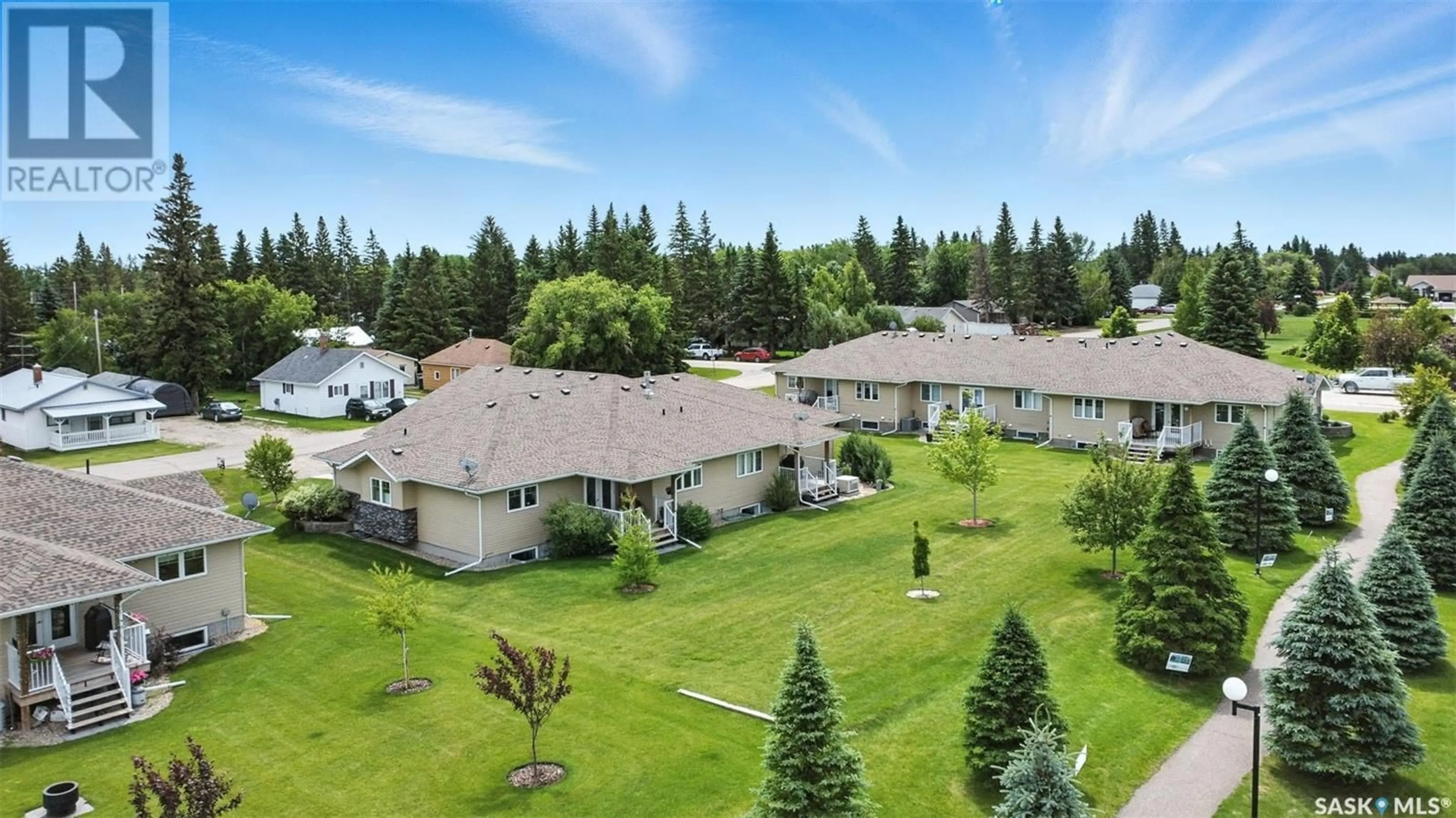 A pic from outside/outdoor area/front of a property/back of a property/a pic from drone, mountain view for 3009 1ST AVENUE, Waldheim Saskatchewan S0K4R0