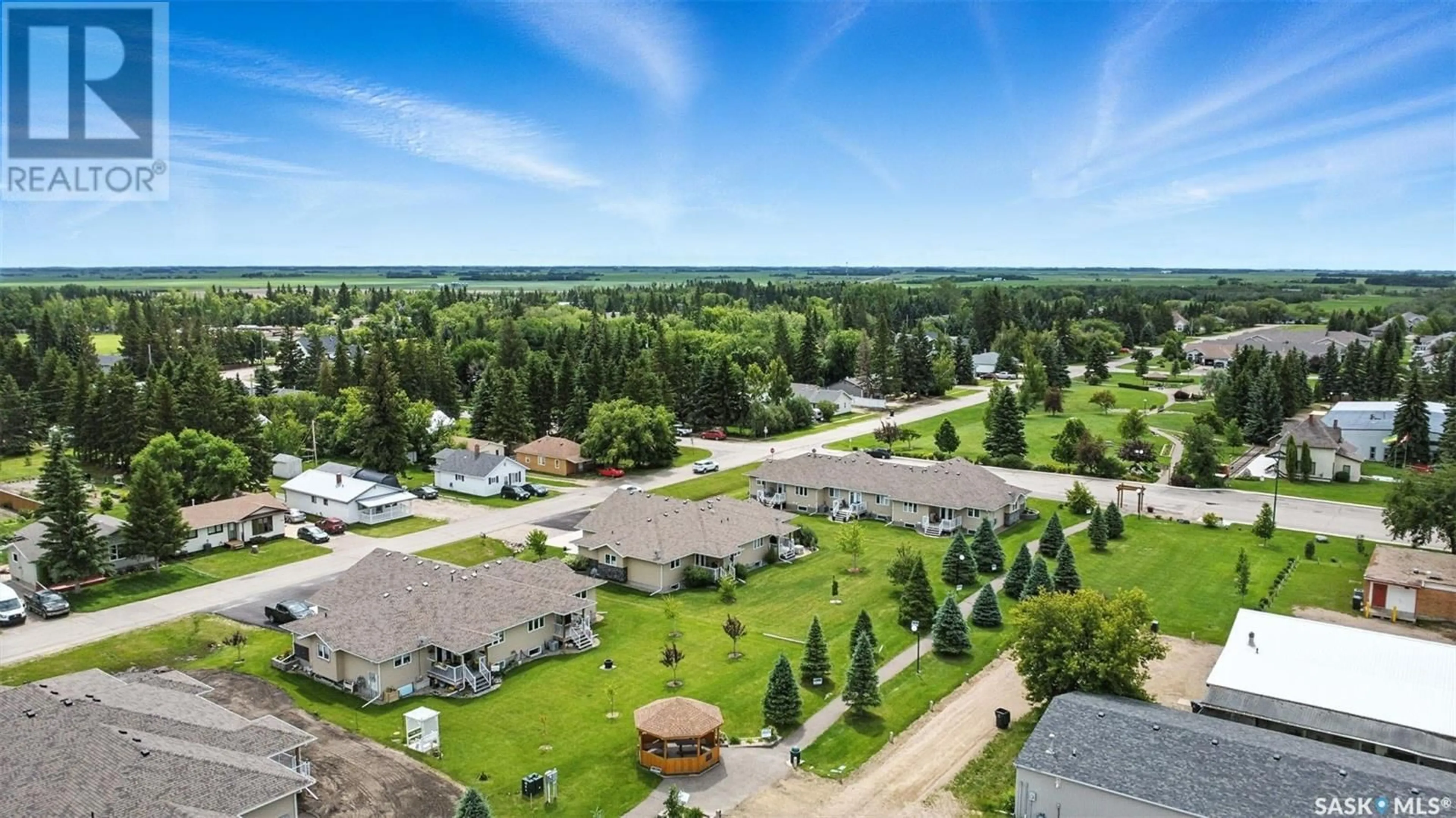A pic from outside/outdoor area/front of a property/back of a property/a pic from drone, unknown for 3009 1ST AVENUE, Waldheim Saskatchewan S0K4R0
