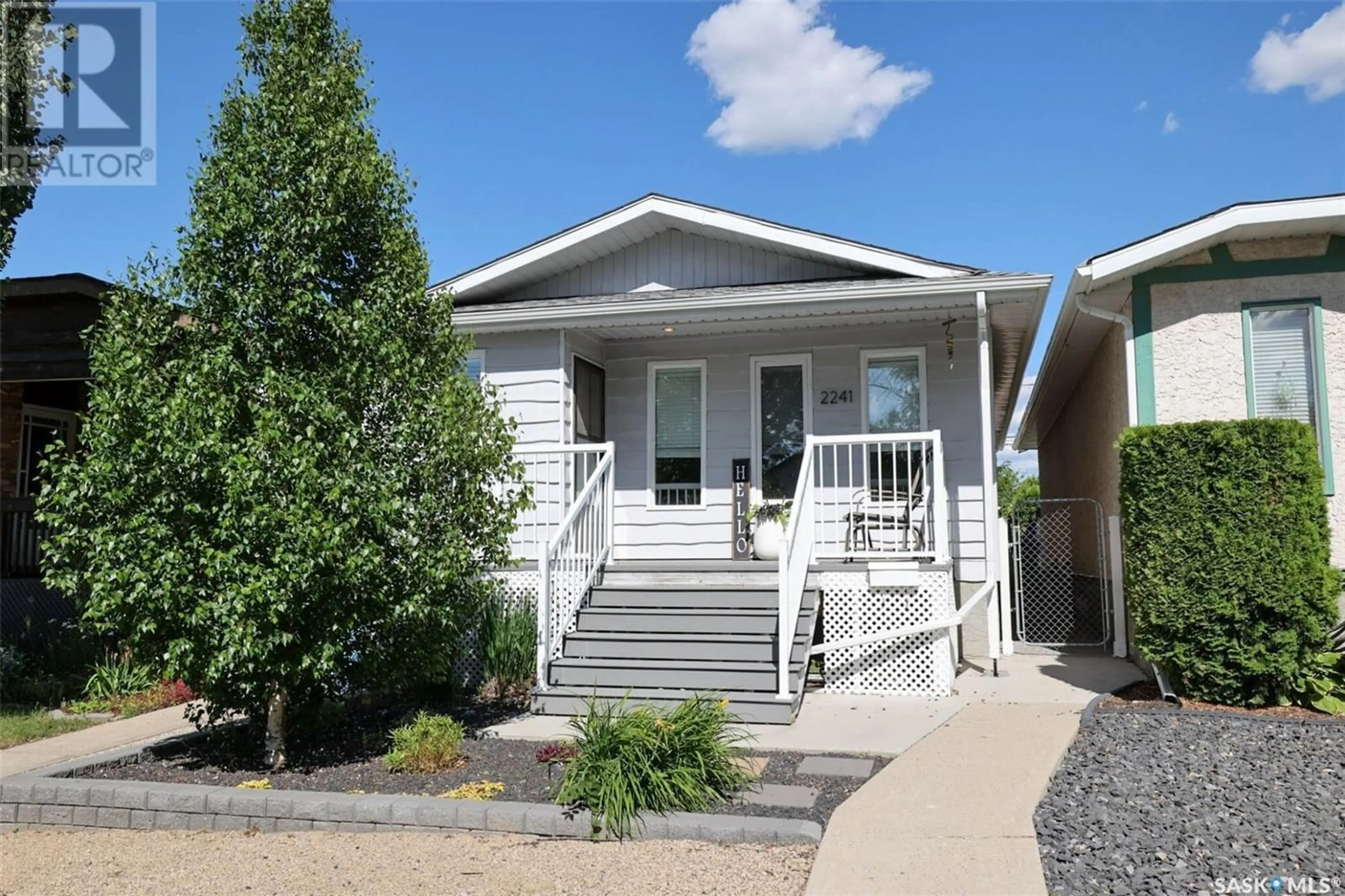 Home with vinyl exterior material, street for 2241 REYNOLDS STREET, Regina Saskatchewan S4N3N4