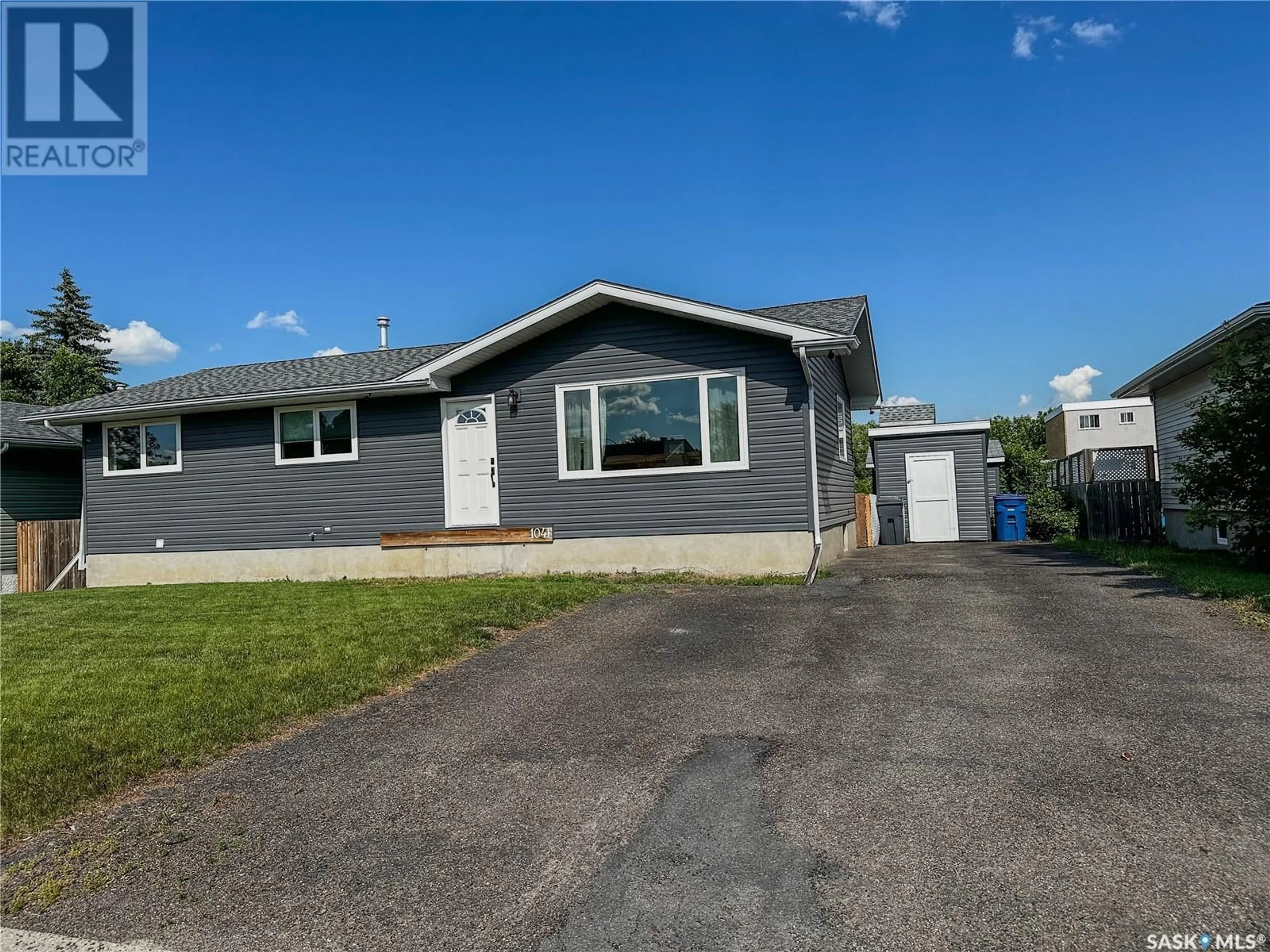 Home with vinyl exterior material, street for 1041 CARLTON DRIVE, Esterhazy Saskatchewan S0A0X0