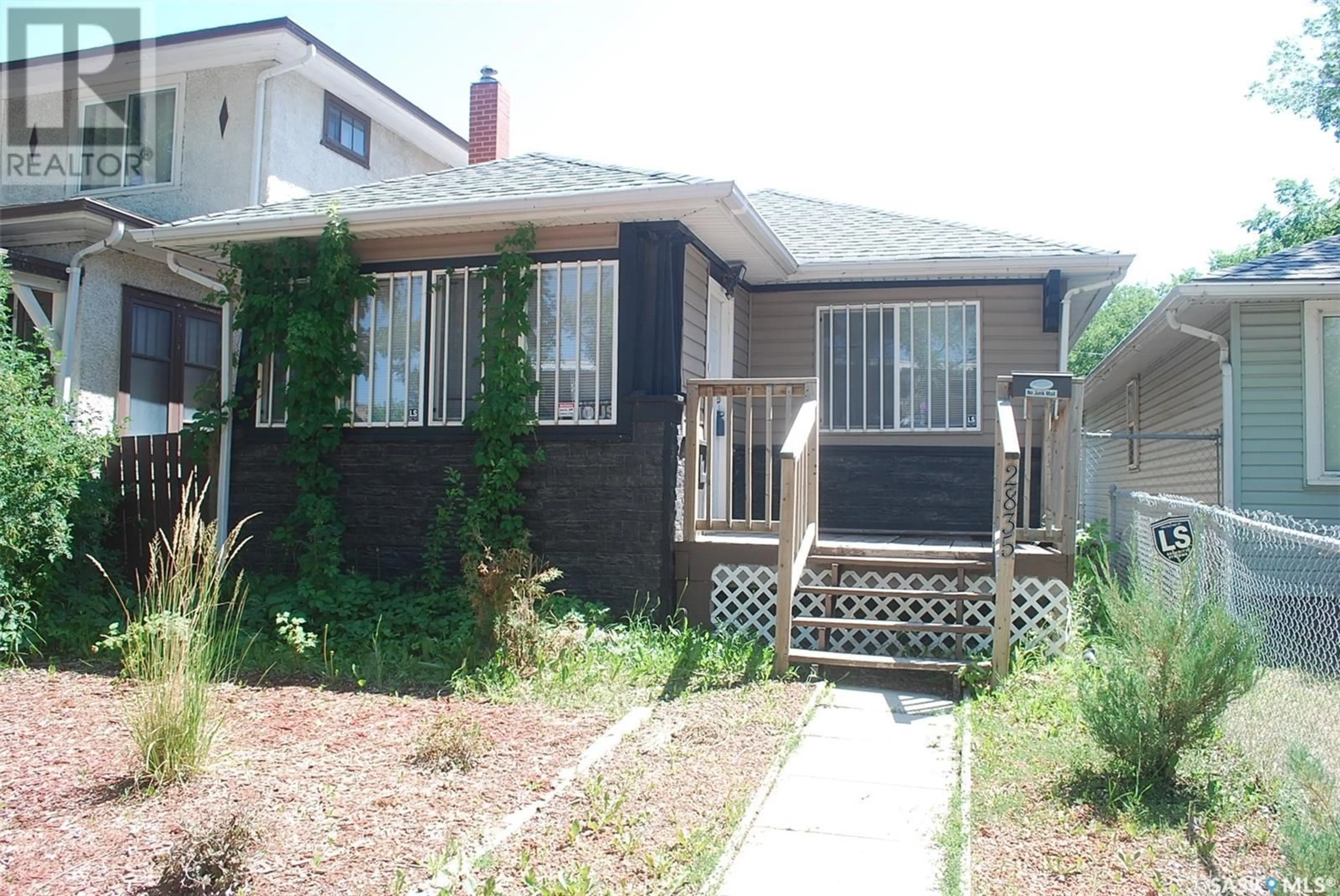 Home with vinyl exterior material, street for 2835 DEWDNEY AVENUE, Regina Saskatchewan S4T0X8