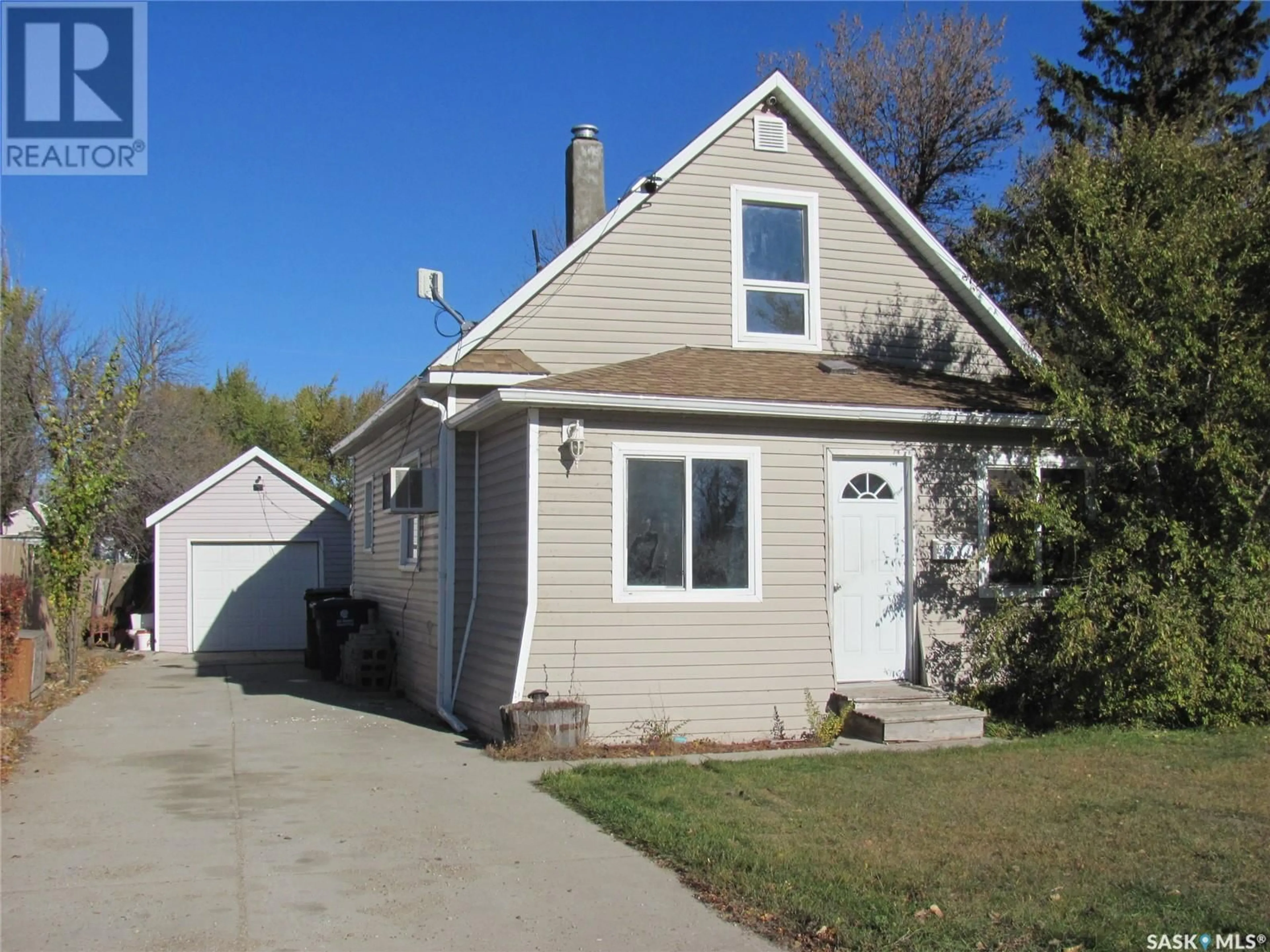 Home with vinyl exterior material, street for 228 AGNES AVENUE, Allan Saskatchewan S0K0C0