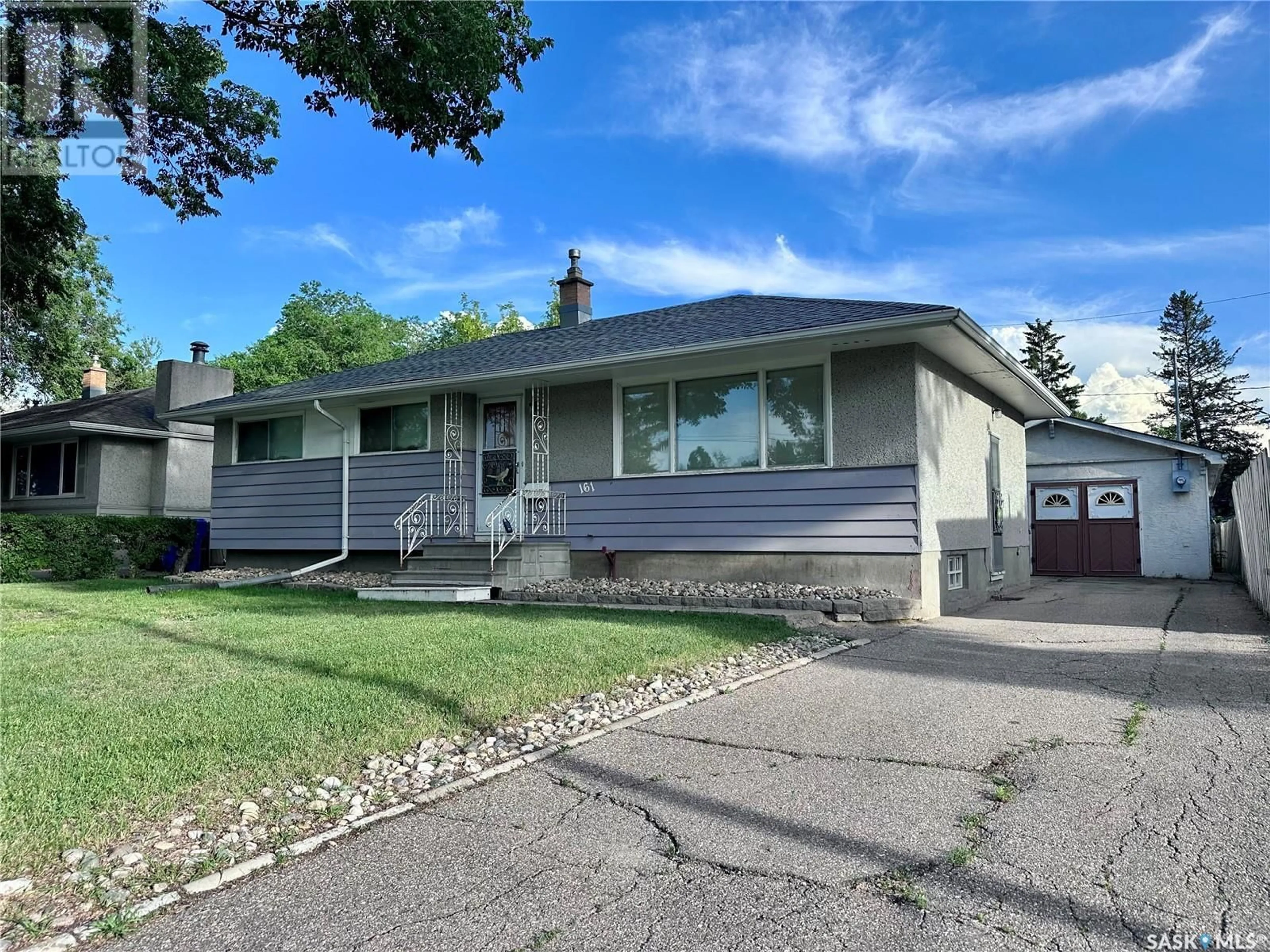 Home with vinyl exterior material, street for 161 COLDWELL ROAD, Regina Saskatchewan S4R4K7