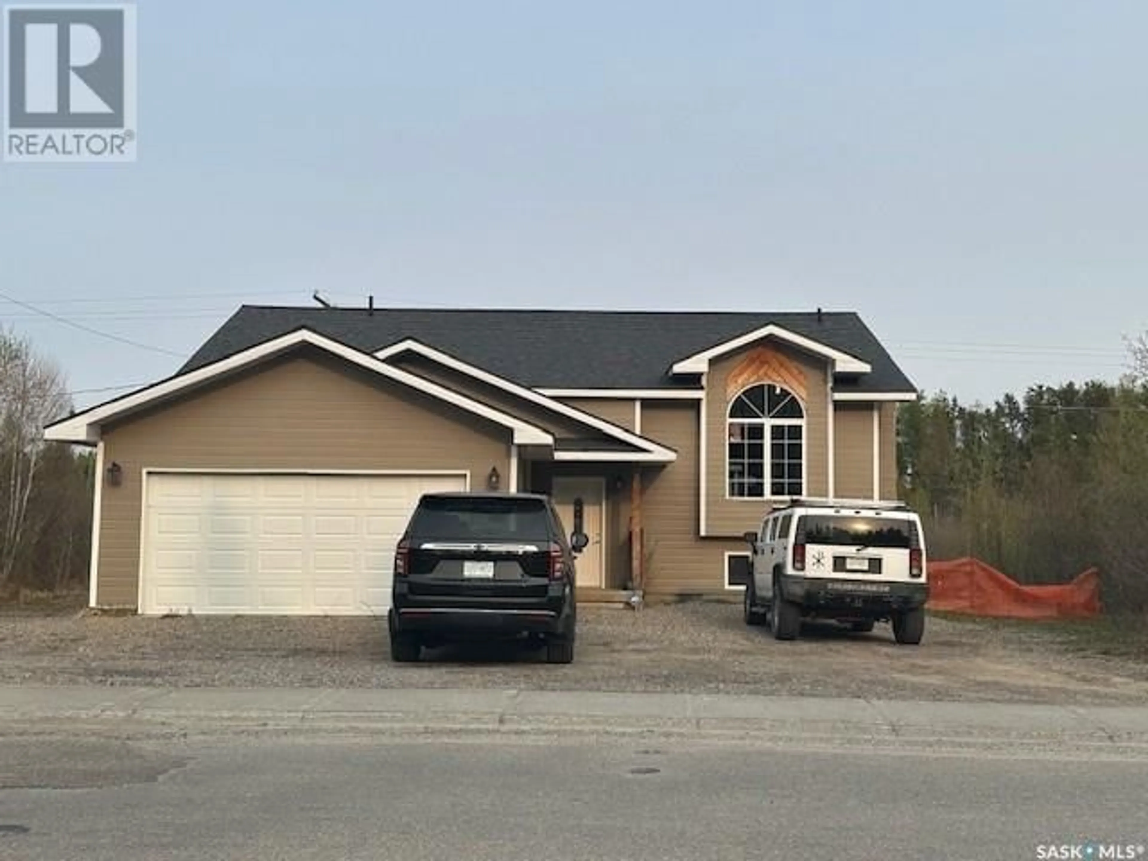 Home with vinyl exterior material, building for 1303 STUDER STREET, La Ronge Saskatchewan S0J1L0
