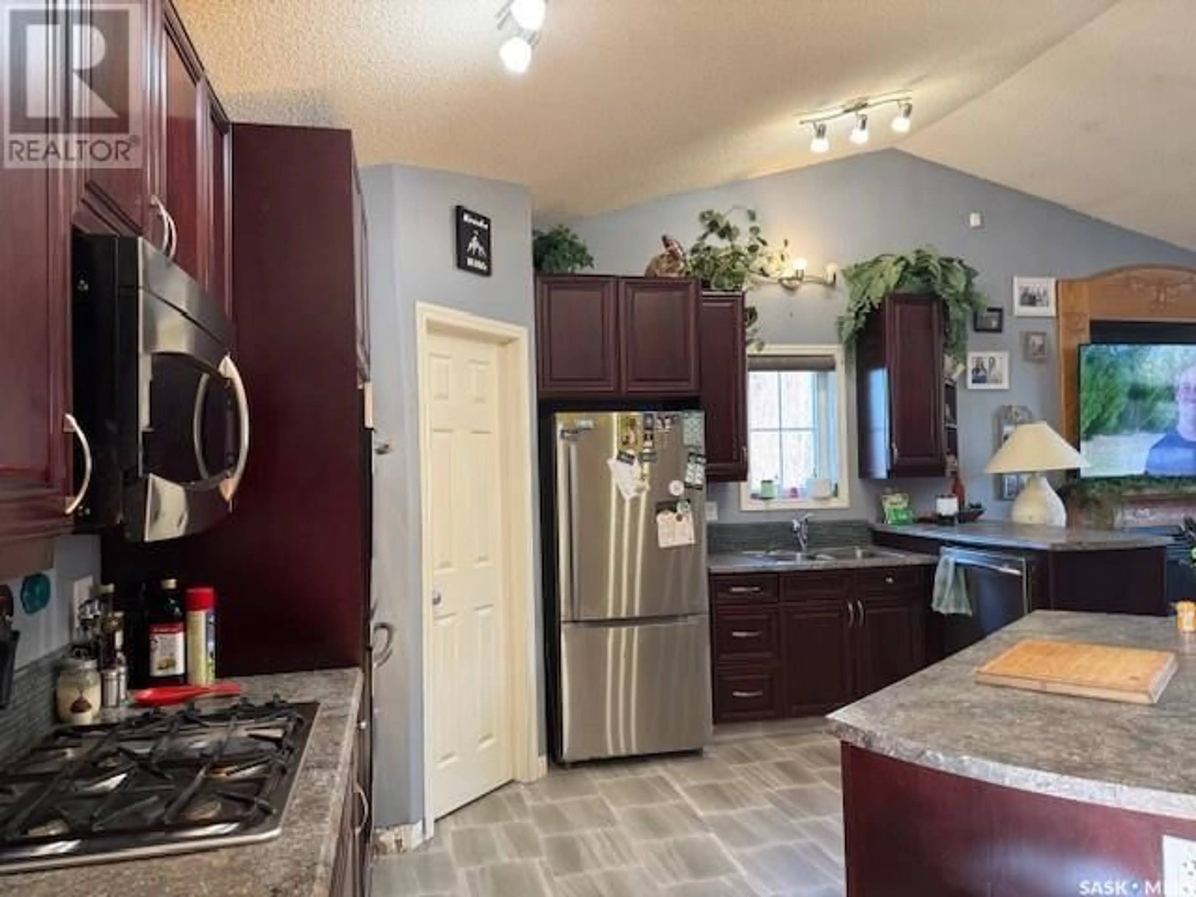 Open concept kitchen, ceramic/tile floor for 1303 STUDER STREET, La Ronge Saskatchewan S0J1L0