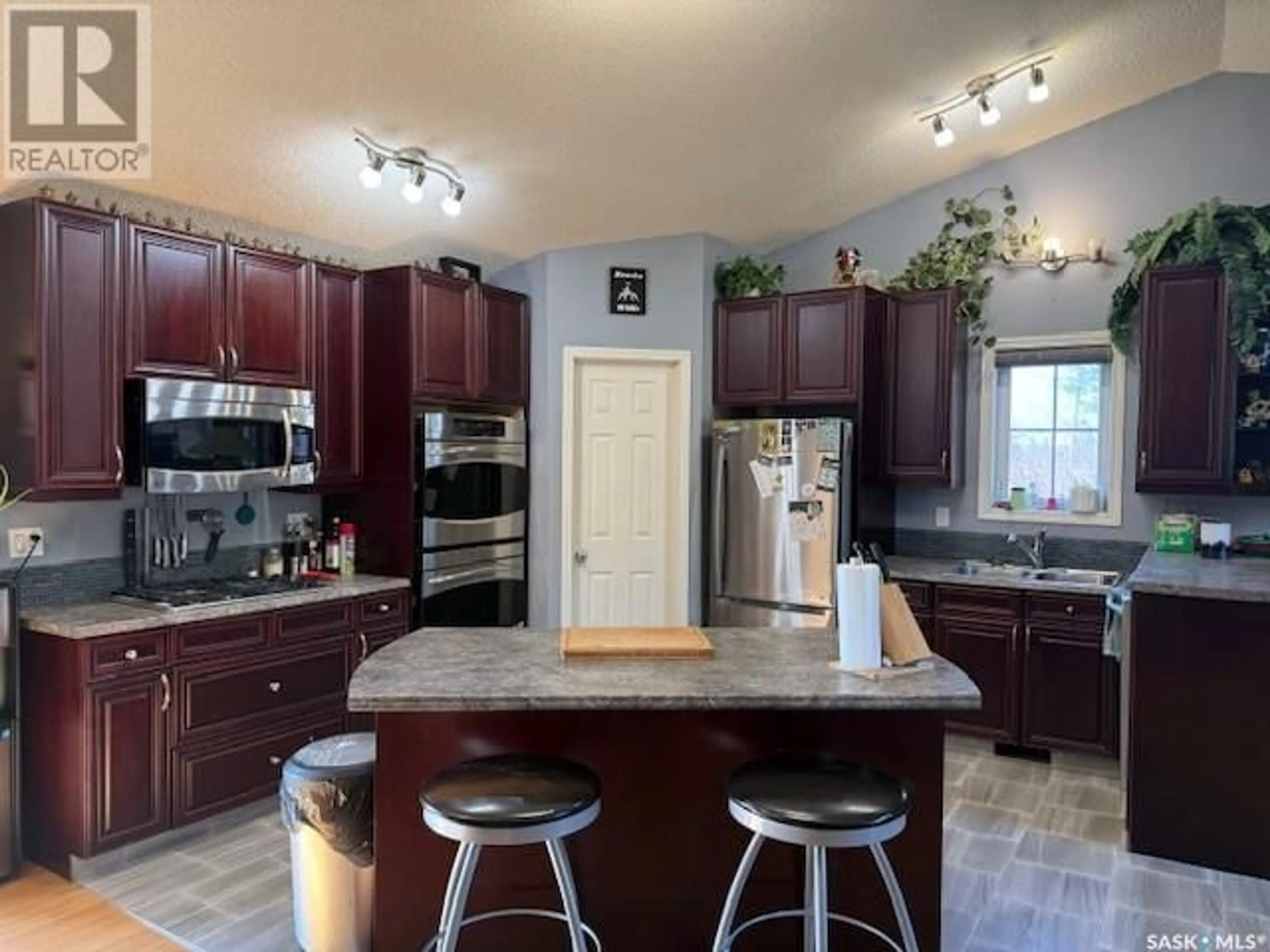 Open concept kitchen, ceramic/tile floor for 1303 STUDER STREET, La Ronge Saskatchewan S0J1L0