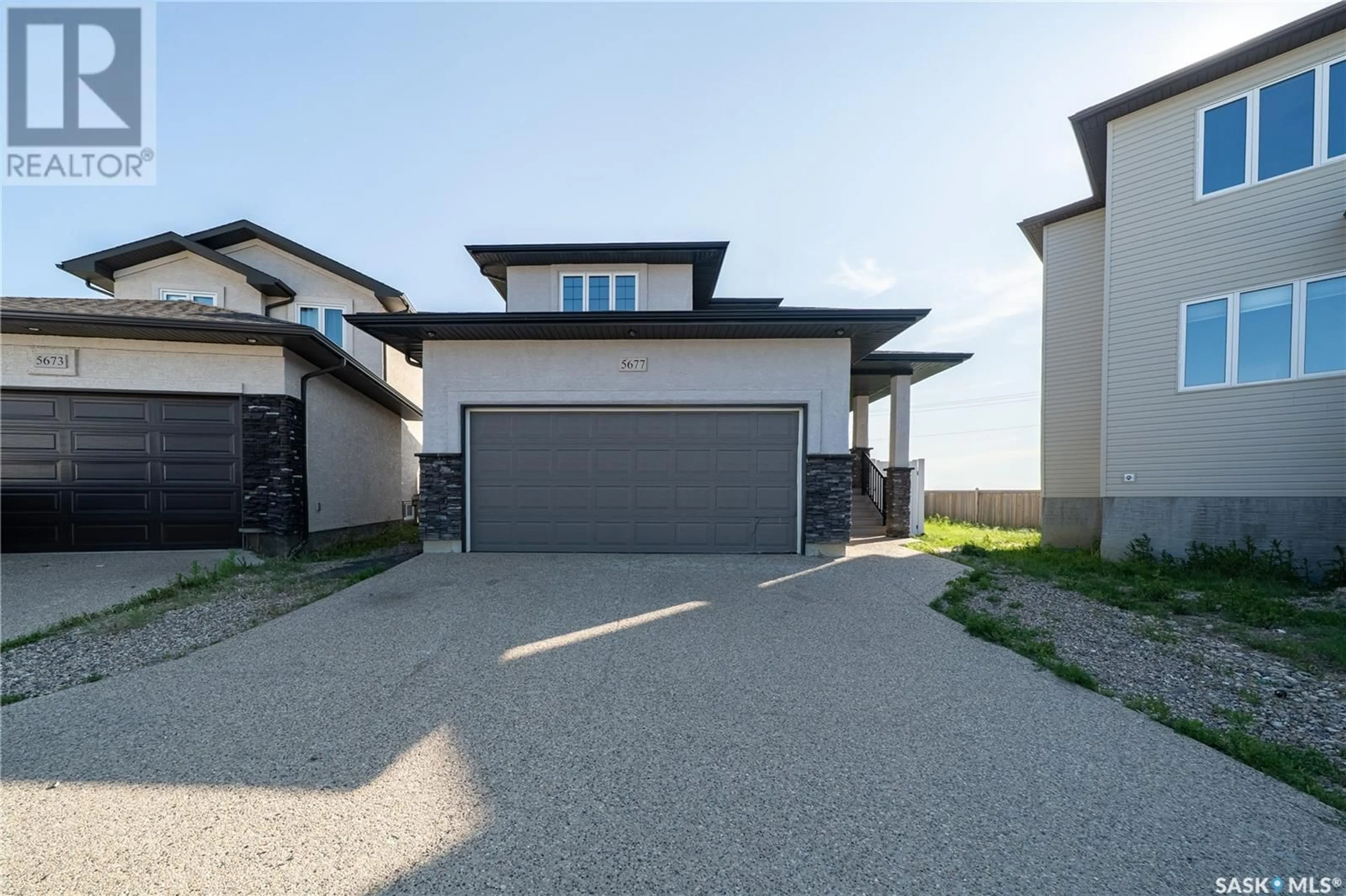 A pic from outside/outdoor area/front of a property/back of a property/a pic from drone, street for 5677 GLIDE CRESCENT, Regina Saskatchewan S4W0P1