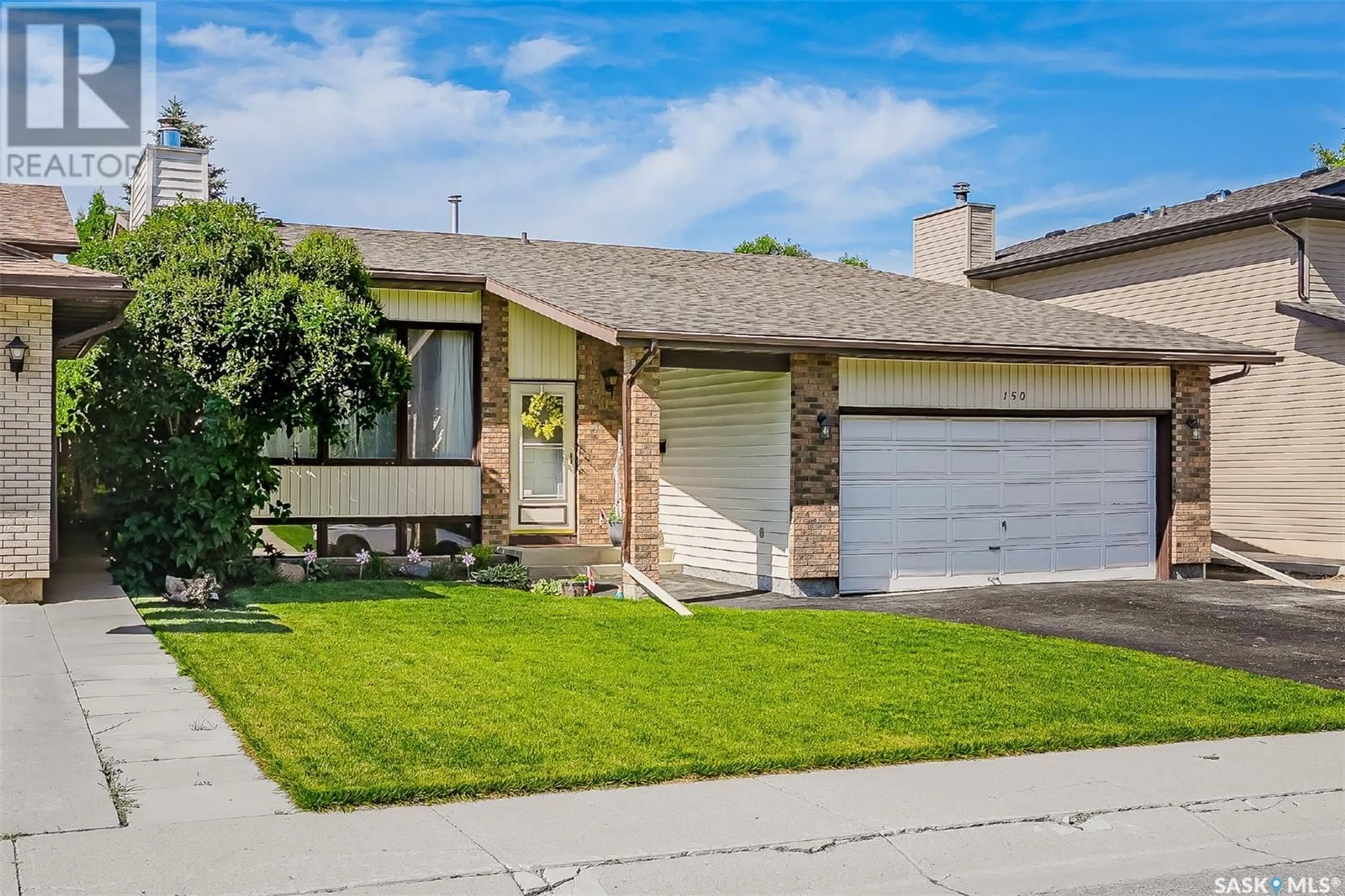 Home with vinyl exterior material, street for 150 BADGER STREET, Saskatoon Saskatchewan S7N2X4