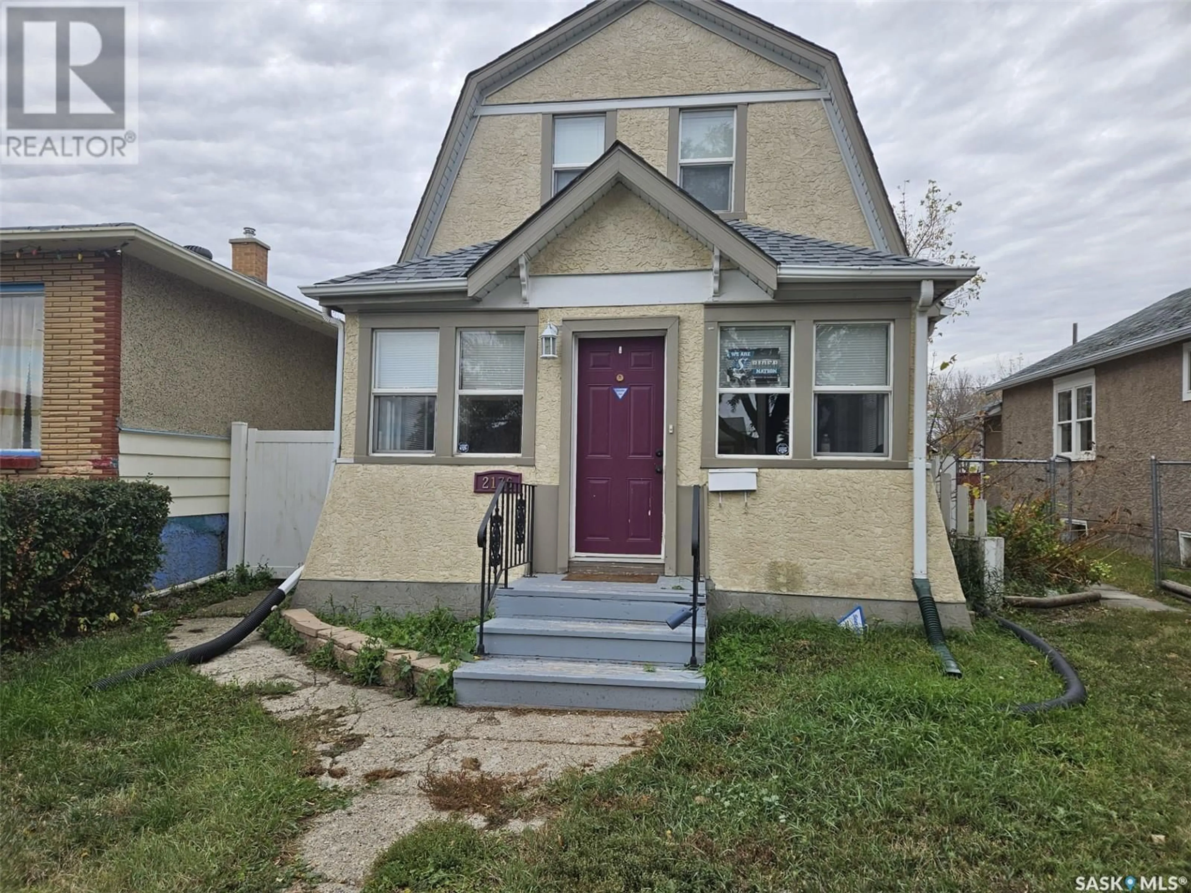 Home with vinyl exterior material, street for 2176 LINDSAY STREET, Regina Saskatchewan S4N3B9