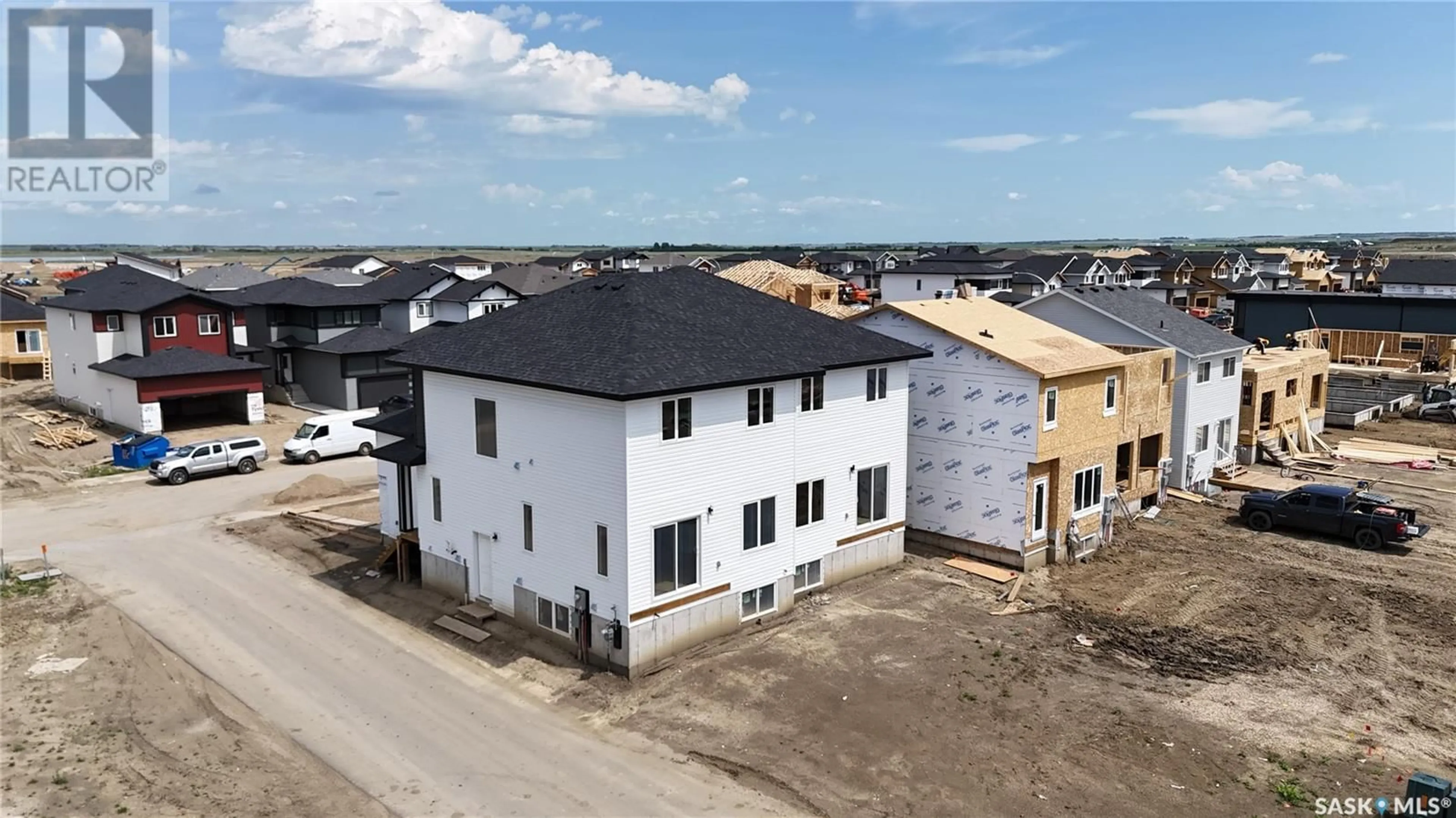 A pic from outside/outdoor area/front of a property/back of a property/a pic from drone, building for 513 SHARMA CRESCENT, Saskatoon Saskatchewan S7W0Y1
