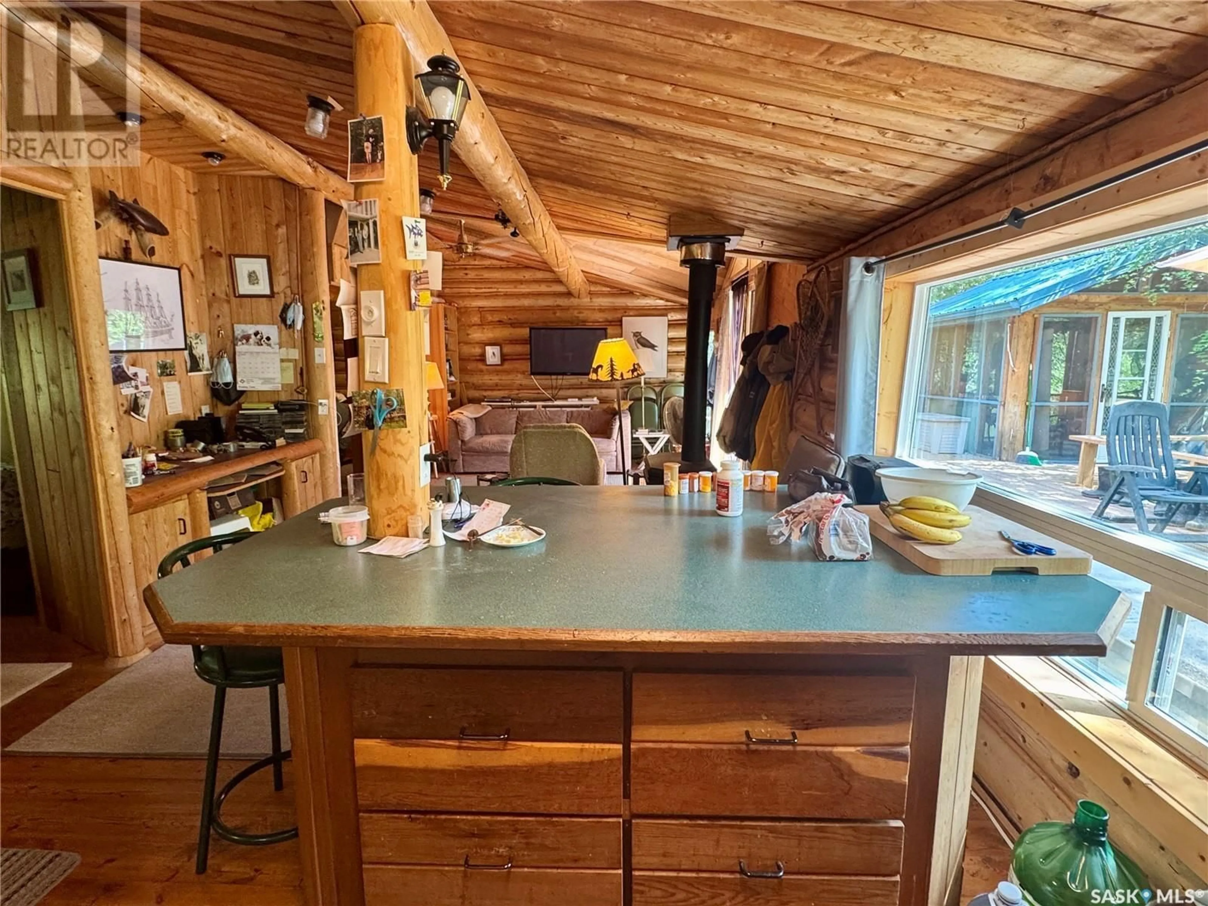 Rustic kitchen, wood/laminate floor for 206 SPRUCE STREET, Northern Admin District Saskatchewan S0J1L0