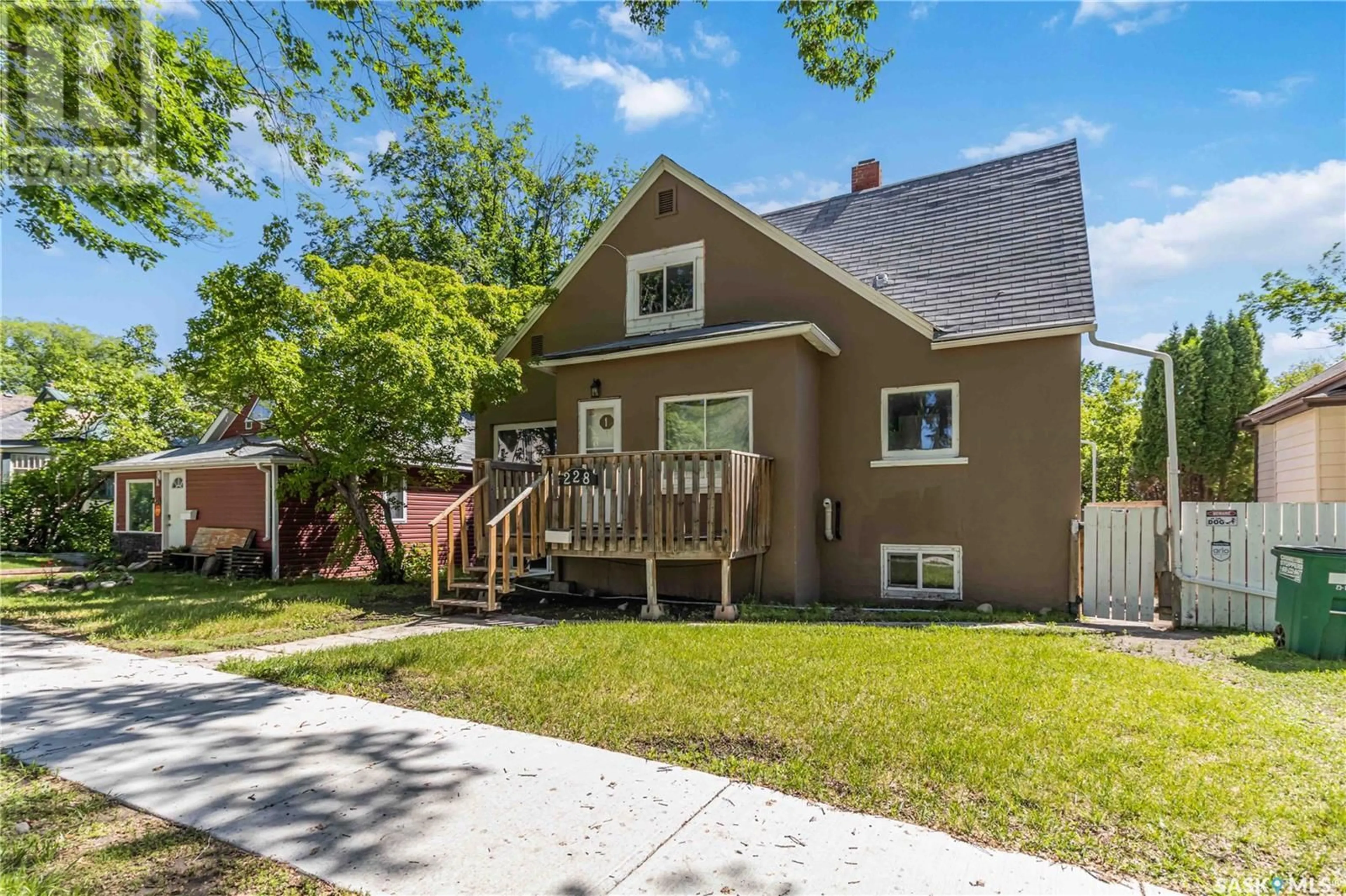 Home with vinyl exterior material, street for 228 F AVENUE, Saskatoon Saskatchewan S7L1W1