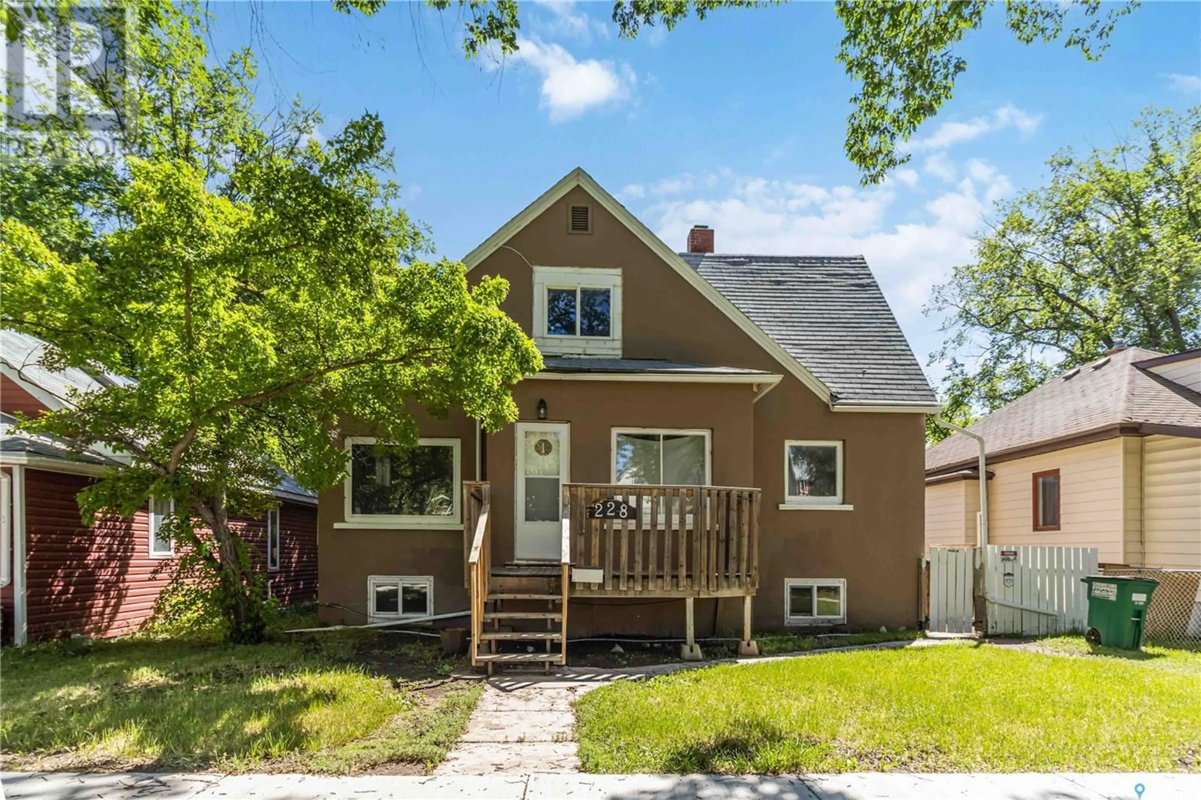 Home with vinyl exterior material, street for 228 F AVENUE, Saskatoon Saskatchewan S7L1W1
