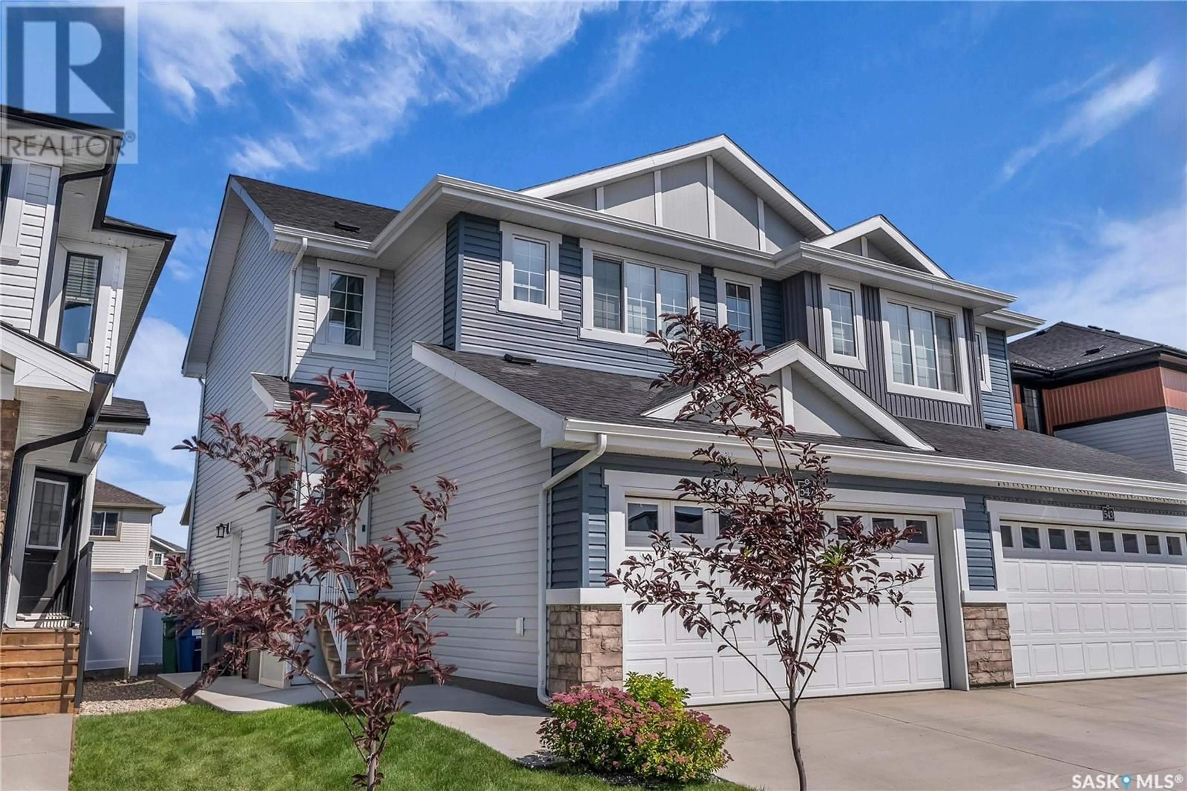 Home with vinyl exterior material, street for 547 SCHMEISER AVENUE, Saskatoon Saskatchewan S7V1N6