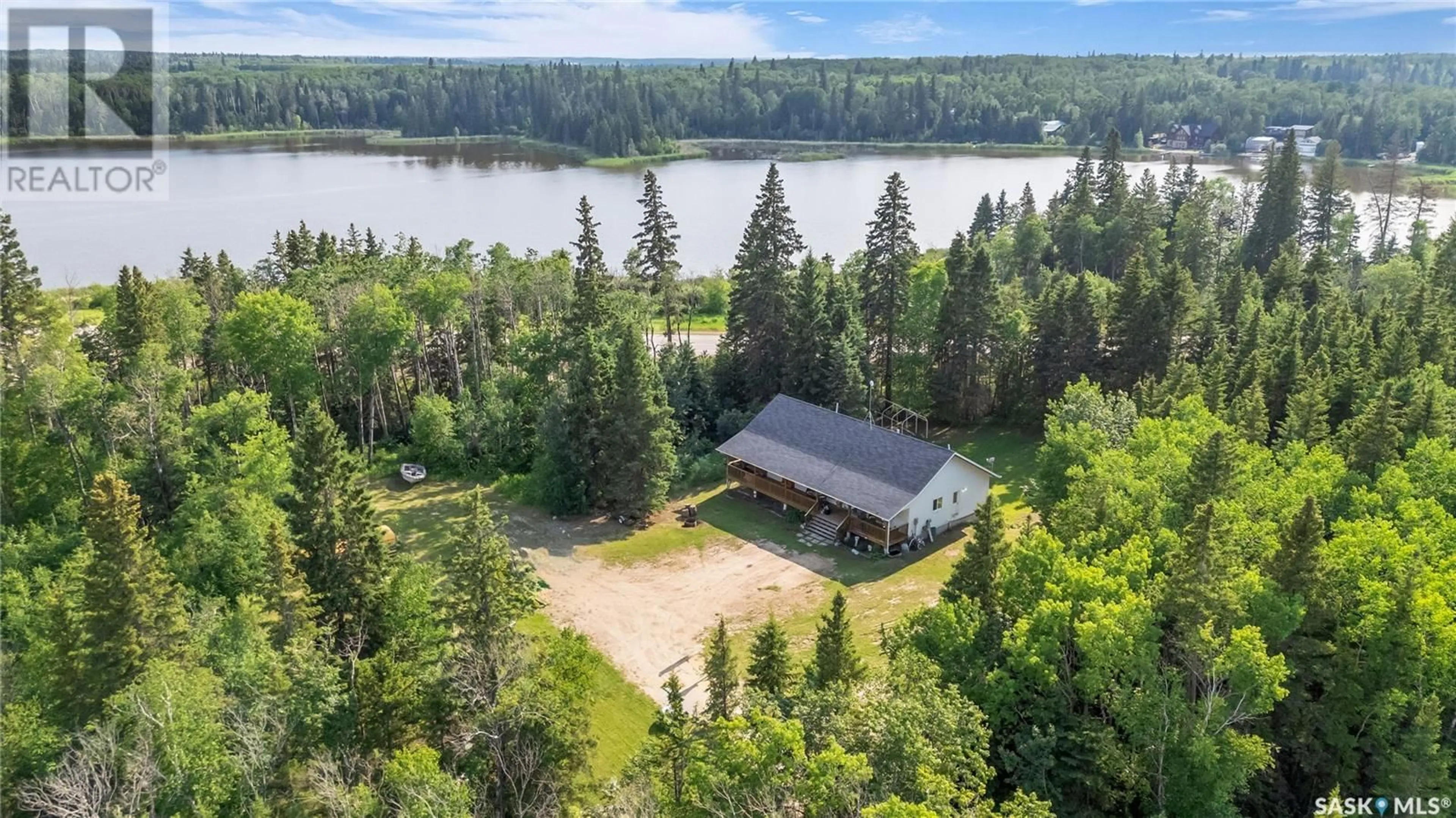 A pic from outside/outdoor area/front of a property/back of a property/a pic from drone, water/lake/river/ocean view for GUSTAFSON ACREAGE, Paddockwood Rm No. 520 Saskatchewan S0J0N0