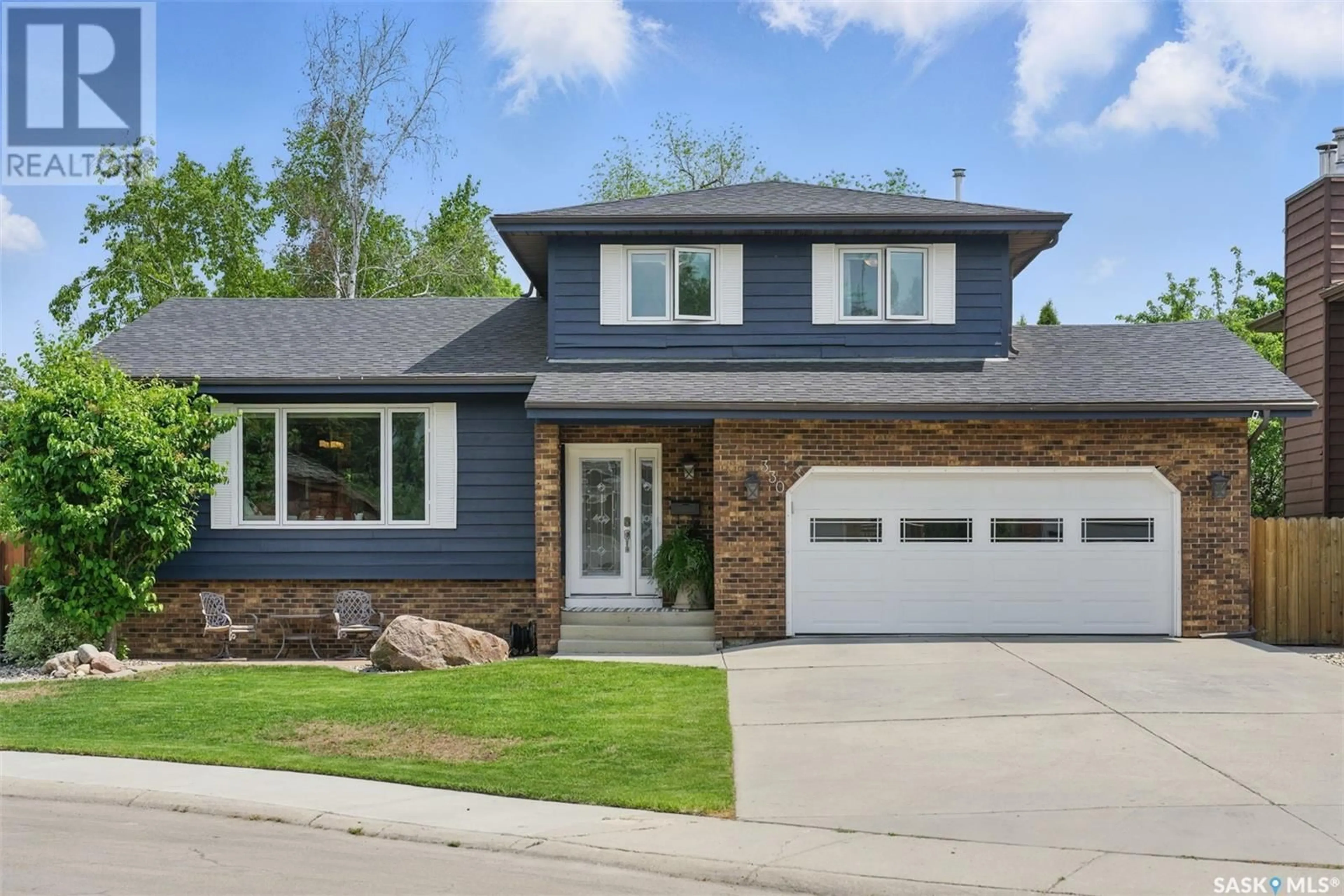 Home with brick exterior material, street for 330 NOKOMIS PLACE, Saskatoon Saskatchewan S7K5E2