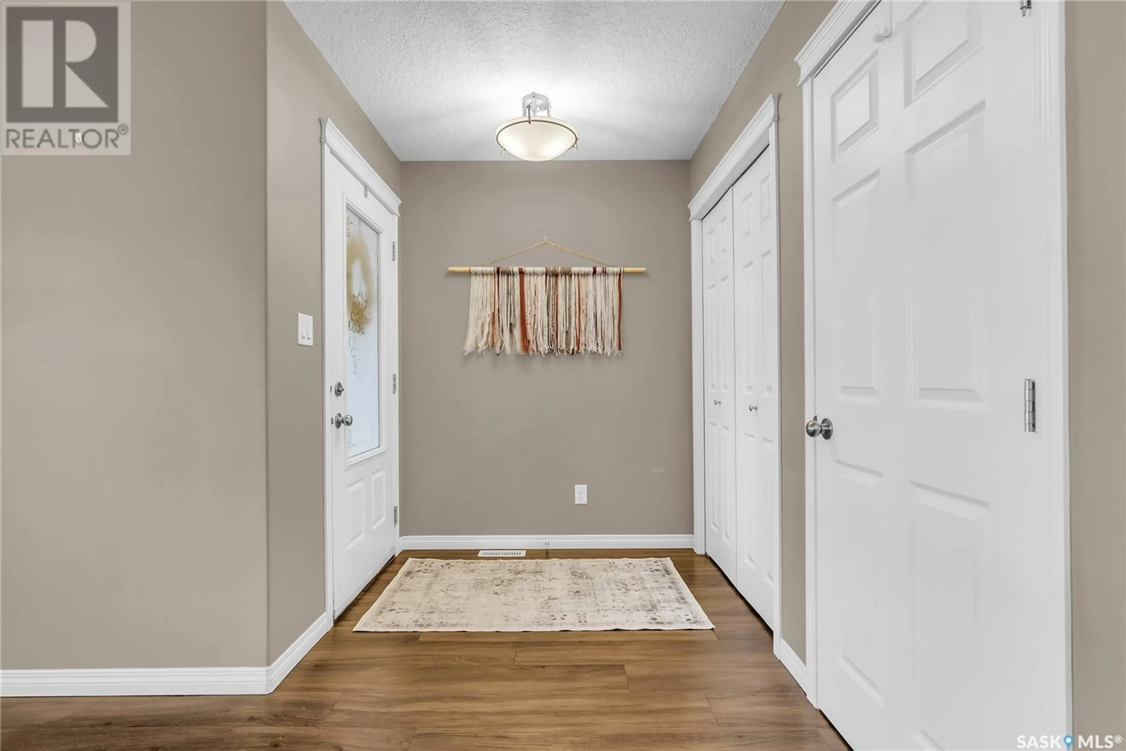 Indoor entryway for 125 - 316 WILLIS CRESCENT, Saskatoon Saskatchewan S7T0T1