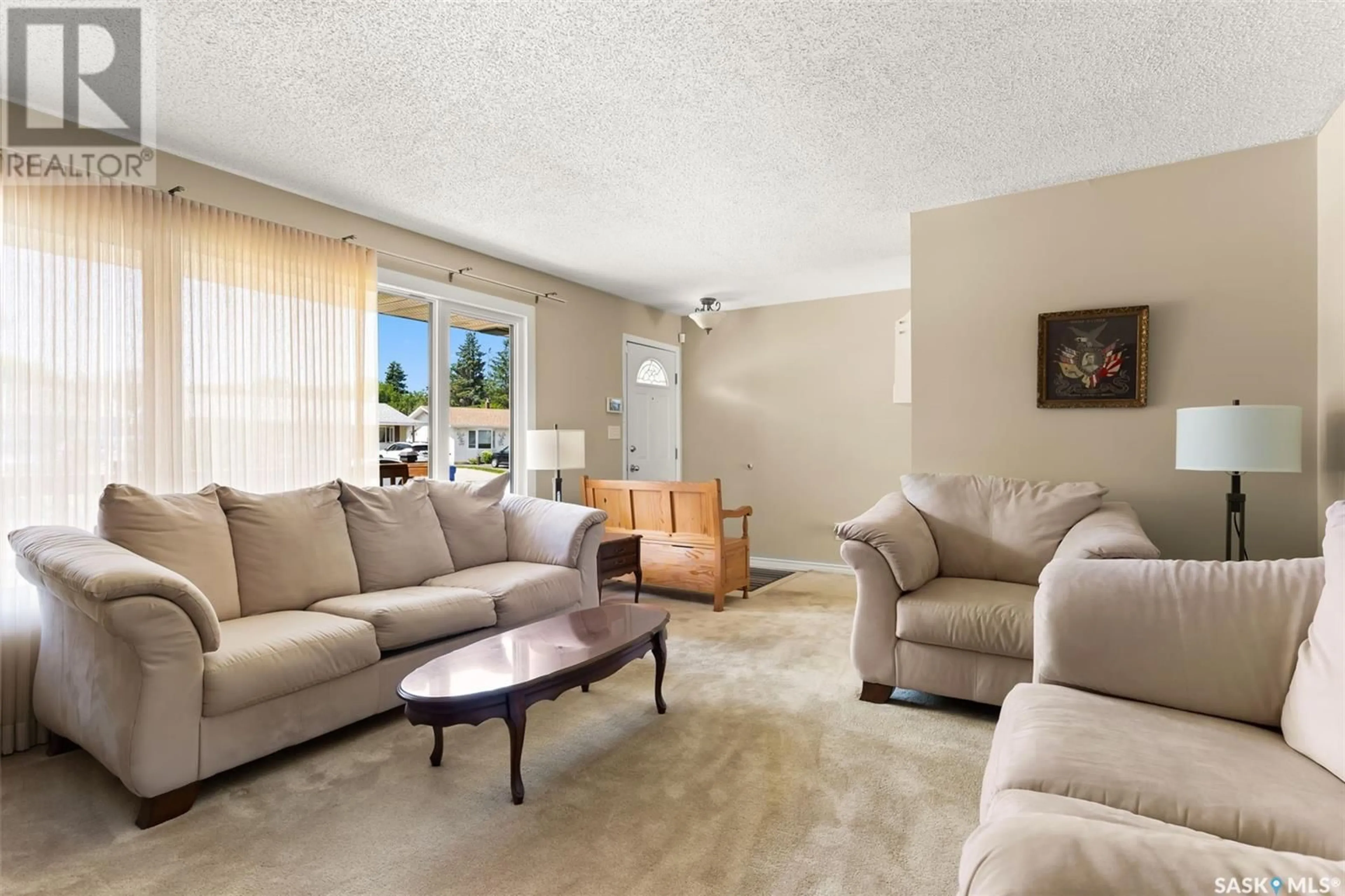 Living room with furniture, unknown for 115 MCSHERRY CRESCENT, Regina Saskatchewan S4T7B5