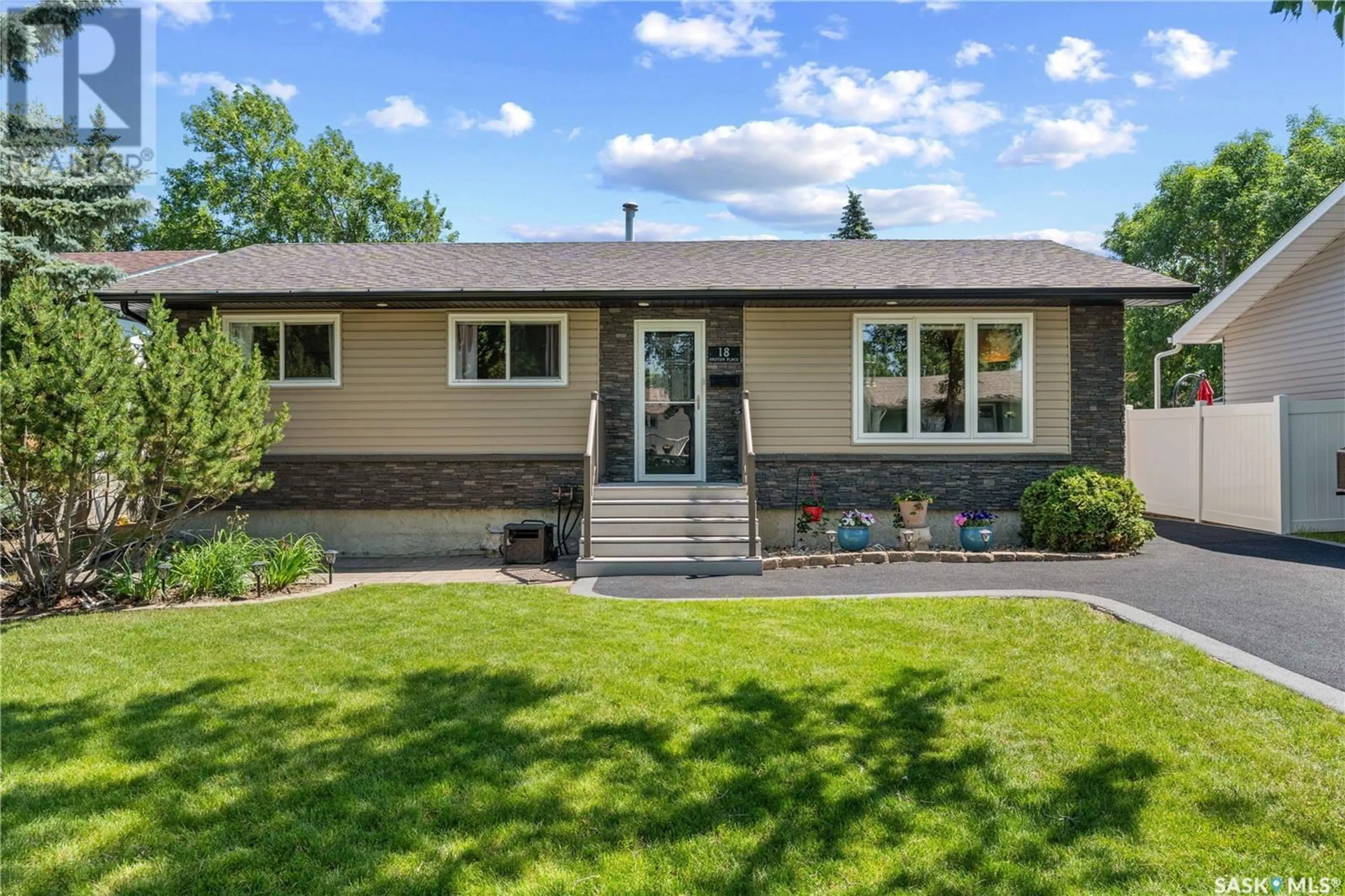 Home with vinyl exterior material, street for 18 BRUTON PLACE, Regina Saskatchewan S4X1P7
