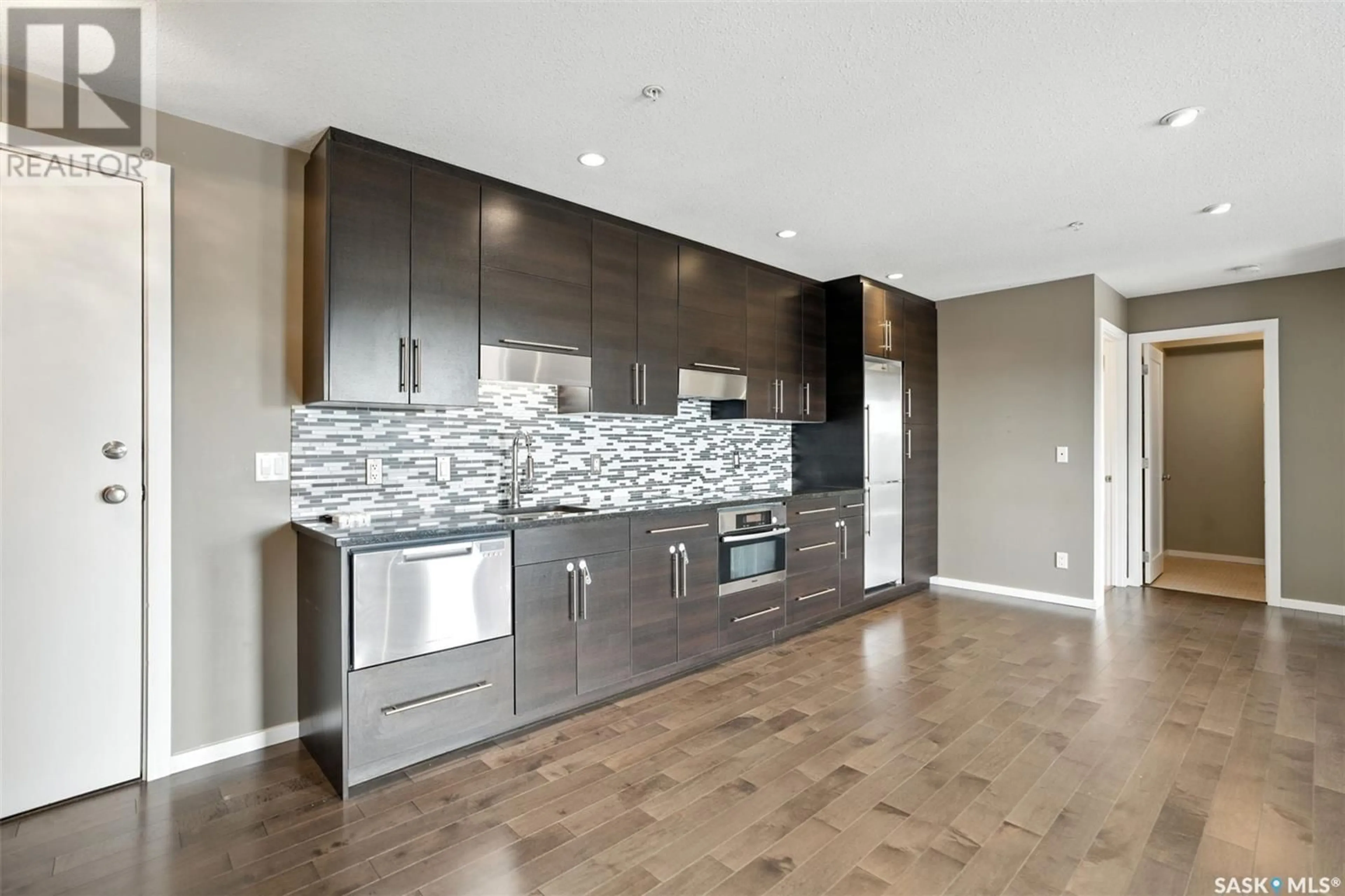 Open concept kitchen, unknown for 230 - 304 SLIMMON ROAD, Saskatoon Saskatchewan S7V0B3
