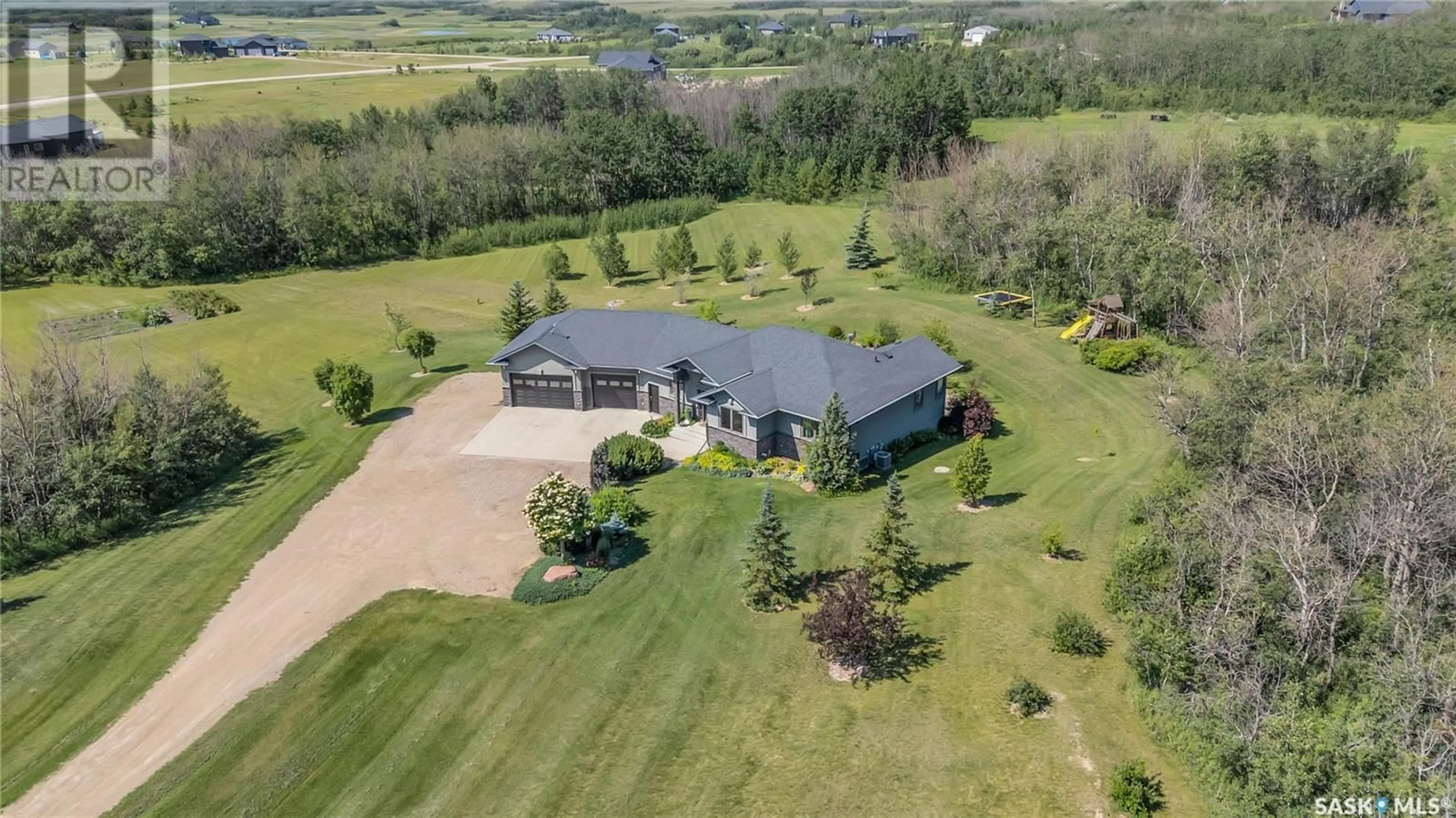 A pic from outside/outdoor area/front of a property/back of a property/a pic from drone, unknown for 104 POPLAR PLACE, Aberdeen Rm No. 373 Saskatchewan S7A0A1