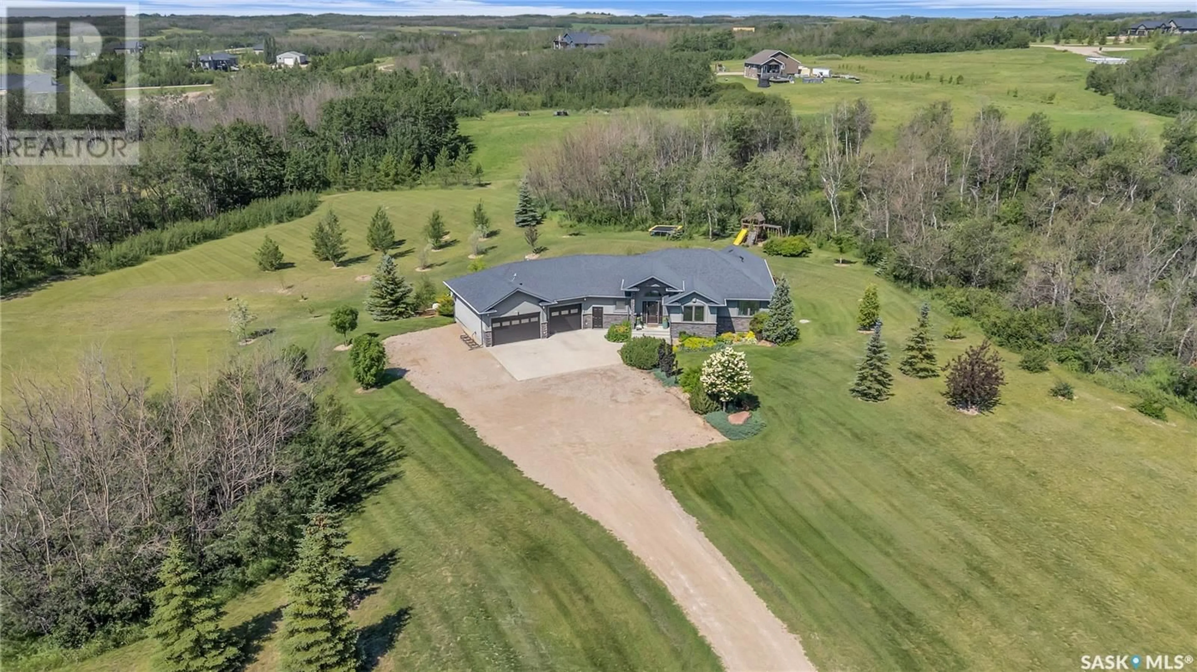 A pic from outside/outdoor area/front of a property/back of a property/a pic from drone, water/lake/river/ocean view for 104 POPLAR PLACE, Aberdeen Rm No. 373 Saskatchewan S7A0A1