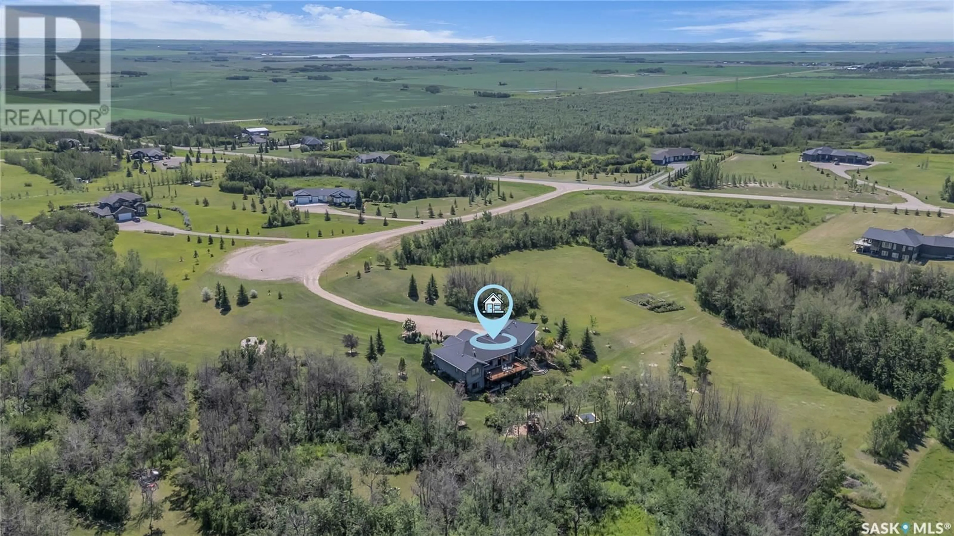 A pic from outside/outdoor area/front of a property/back of a property/a pic from drone, mountain view for 104 POPLAR PLACE, Aberdeen Rm No. 373 Saskatchewan S7A0A1