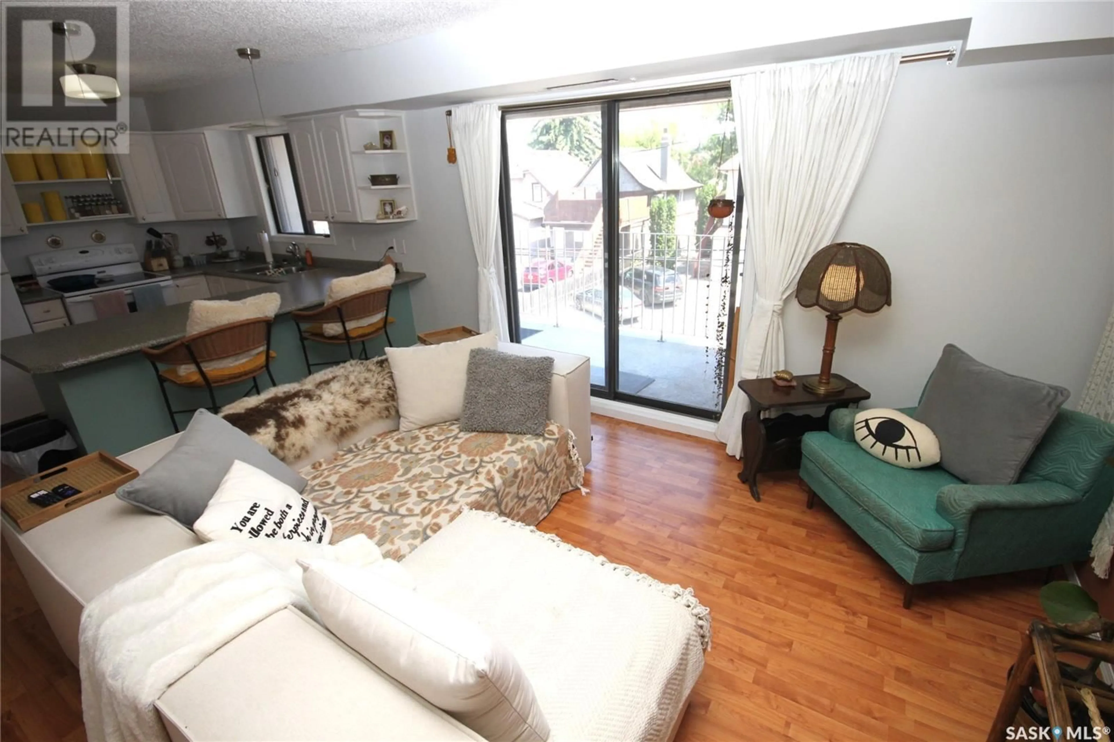 Living room with furniture, unknown for 217 - 2315 MCINTYRE STREET, Regina Saskatchewan S4P3Y8