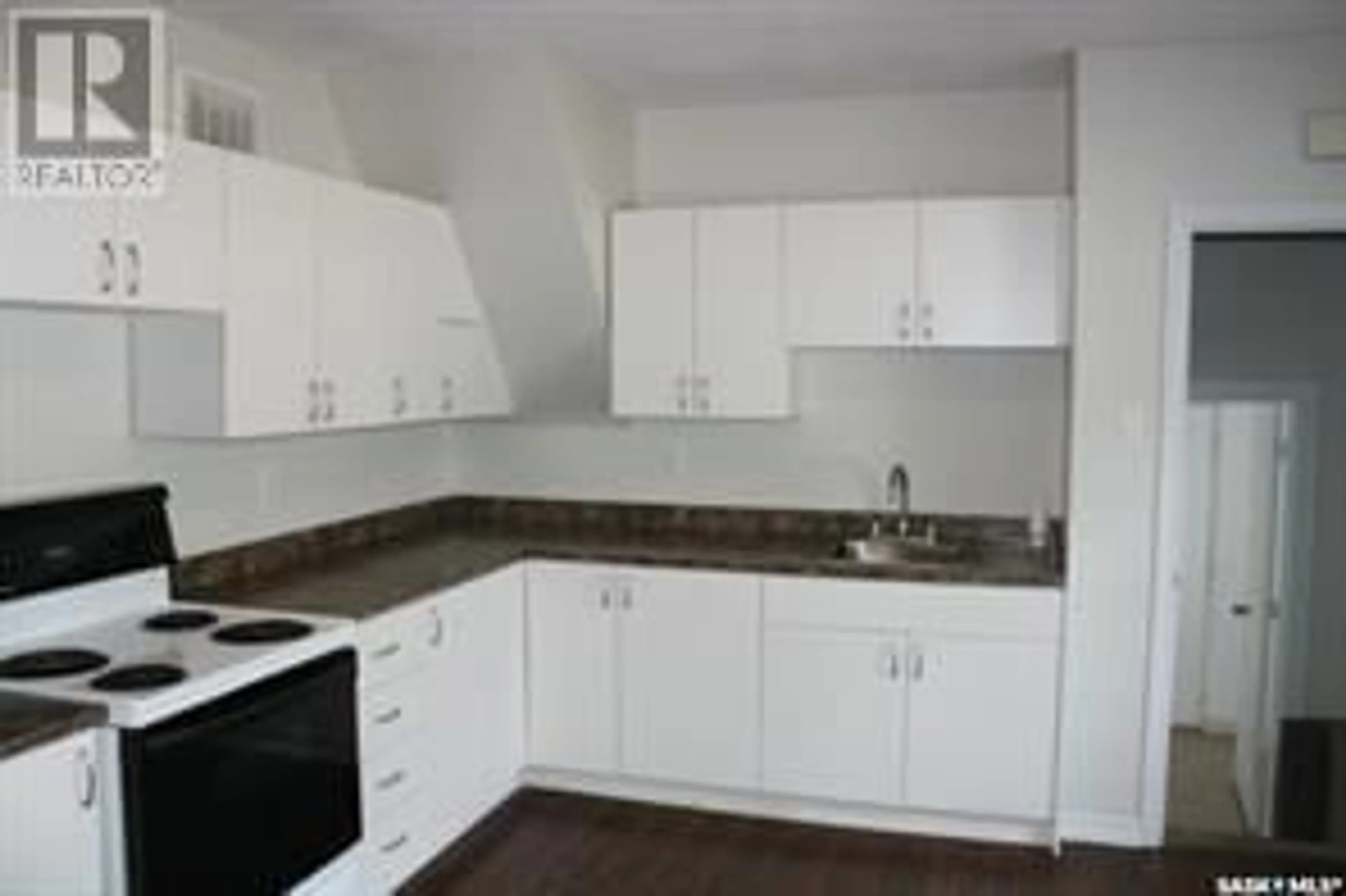 Standard kitchen, wood/laminate floor for 1111 23RD STREET, Saskatoon Saskatchewan S7L0A7