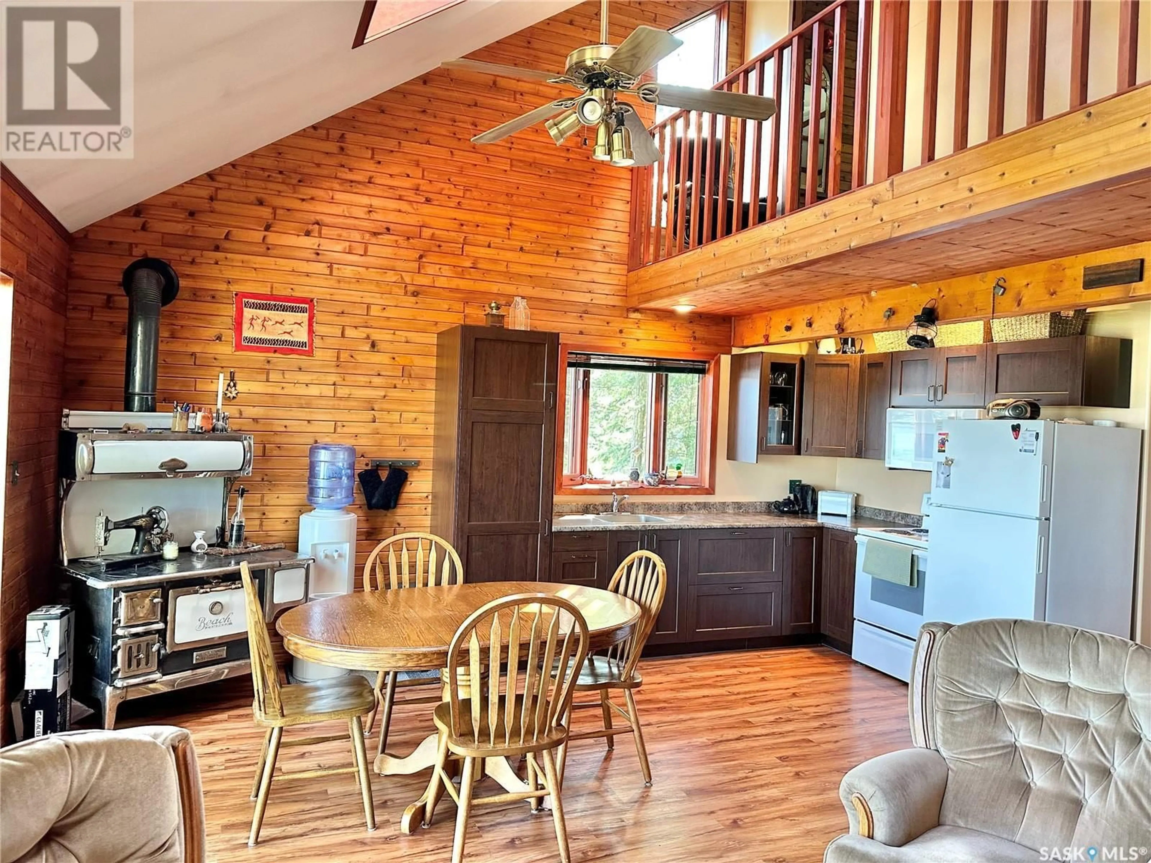 Open concept kitchen, wood/laminate floor for 33 GROUSE ROAD, Big Shell Saskatchewan S0J2G0