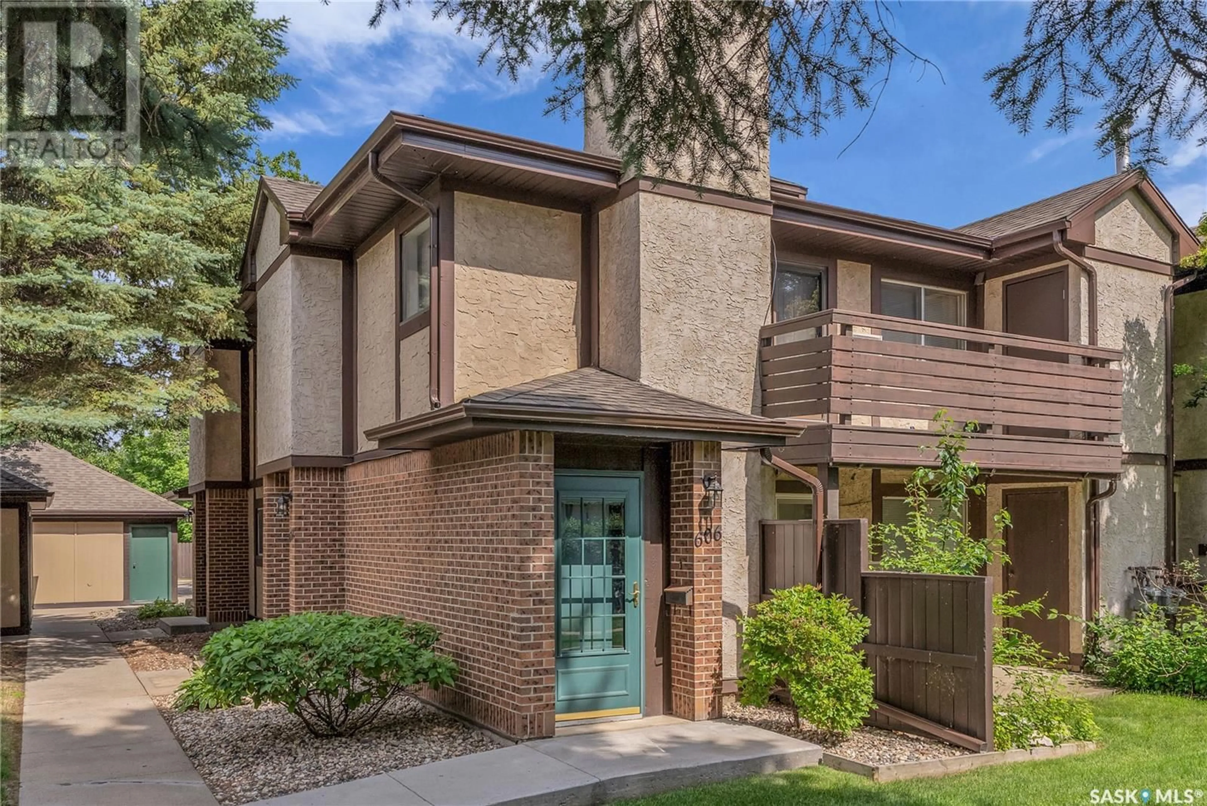 Home with brick exterior material, street for 603 - 606 LENORE DRIVE, Saskatoon Saskatchewan S7K6S1