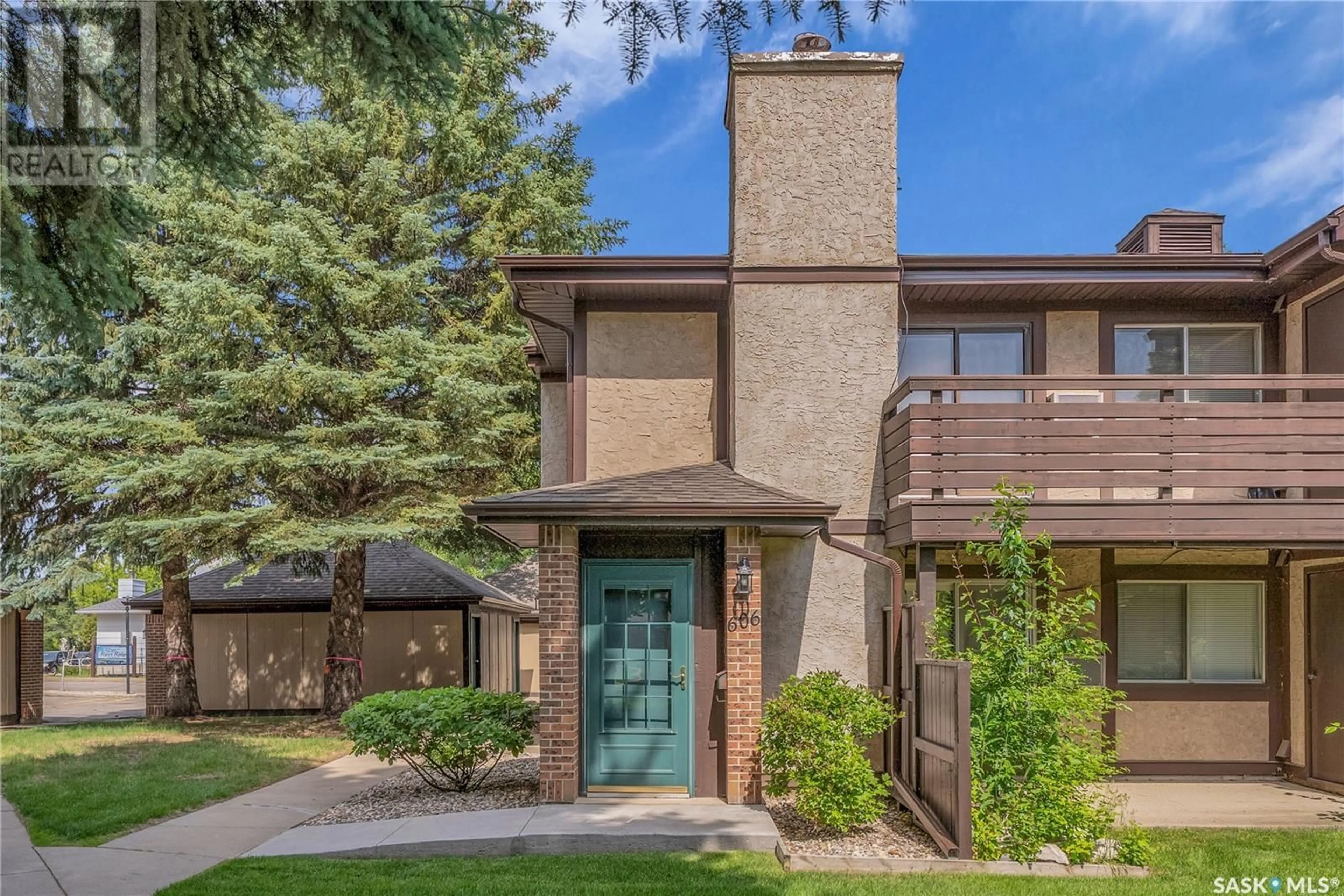 Home with brick exterior material, street for 603 - 606 LENORE DRIVE, Saskatoon Saskatchewan S7K6S1
