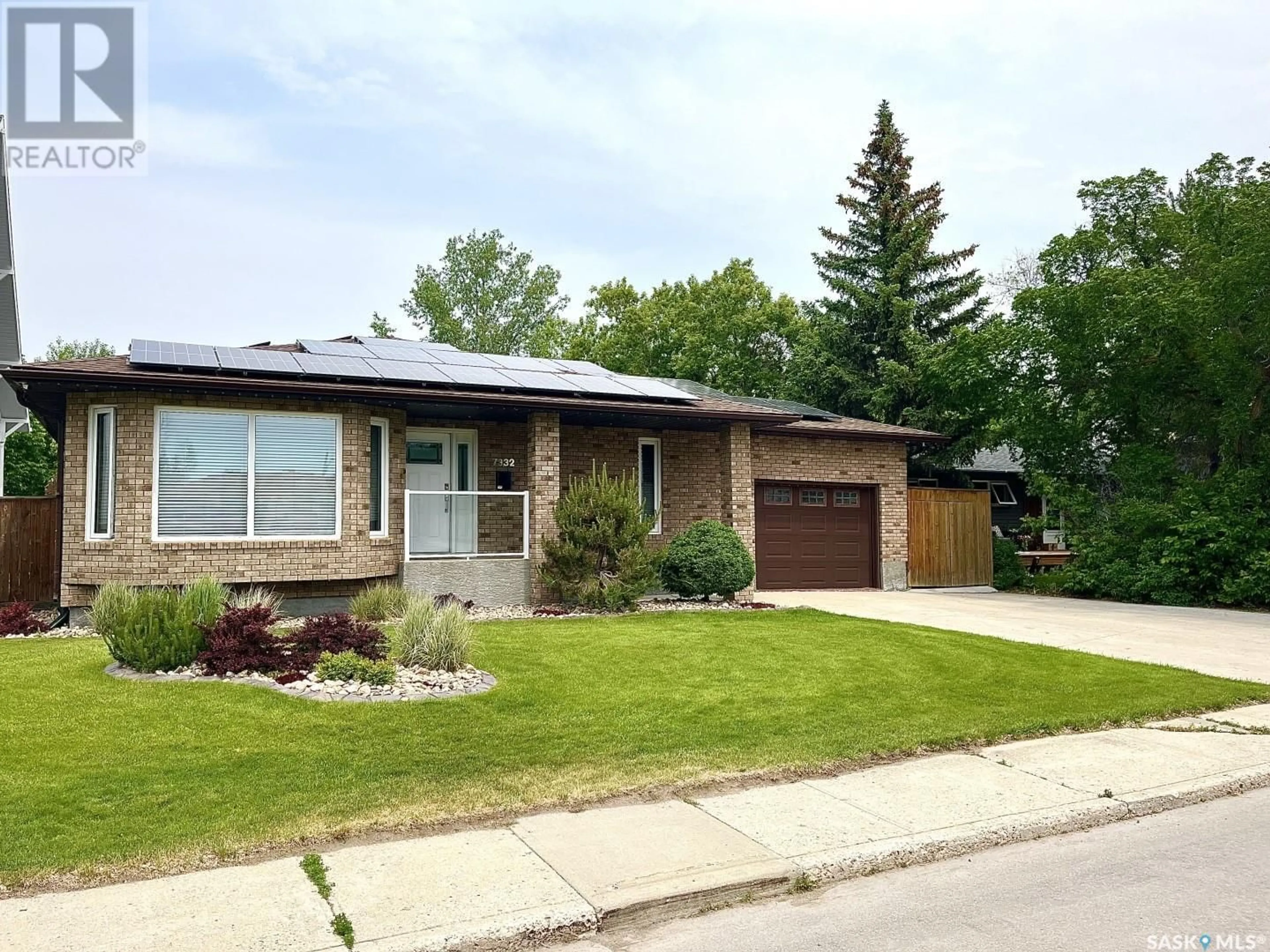 Home with brick exterior material, street for 7332 7TH AVENUE, Regina Saskatchewan S4T0T1