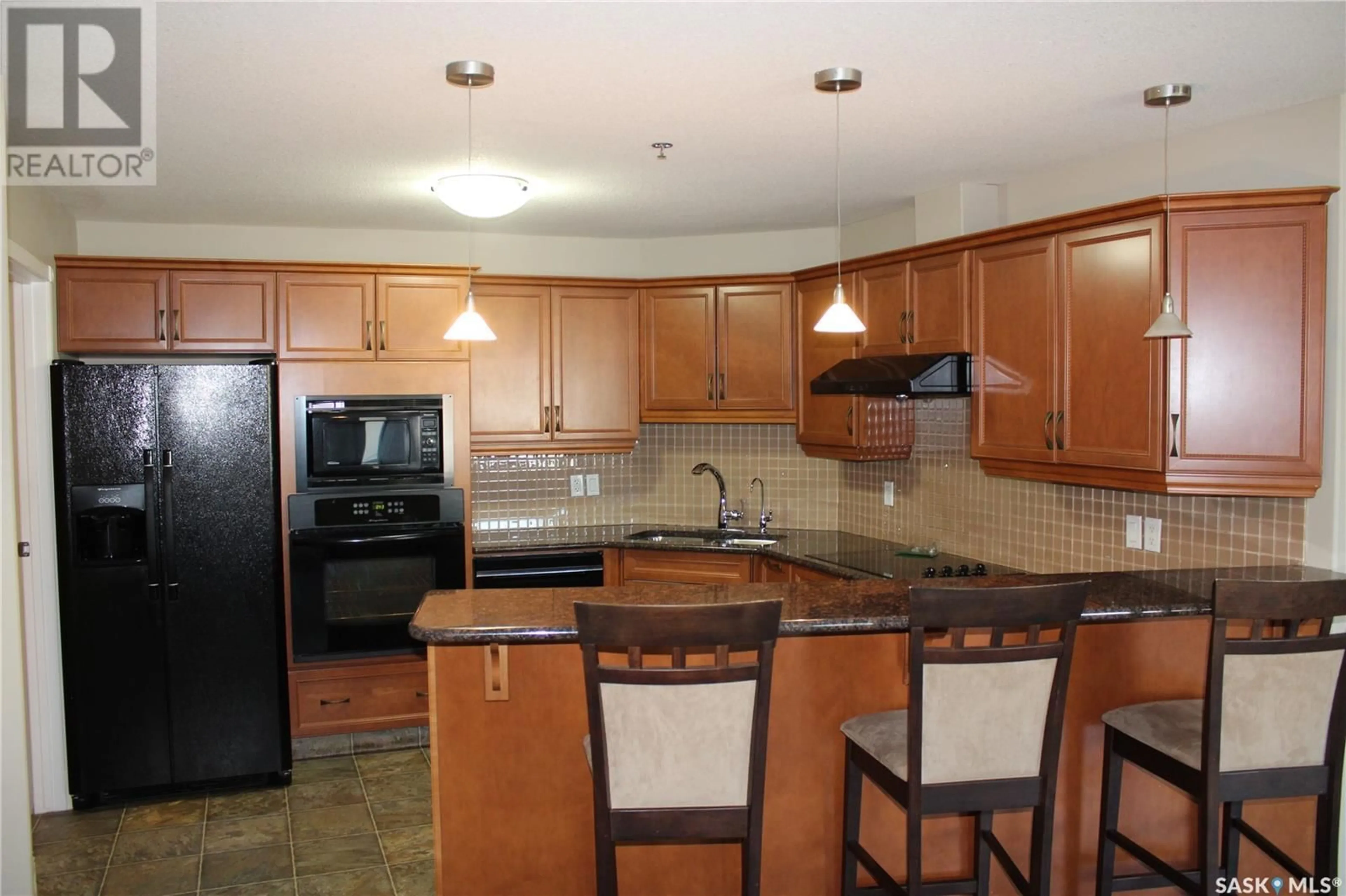 Standard kitchen, ceramic/tile floor for 104 75 SOURIS AVENUE, Weyburn Saskatchewan S4H0C1