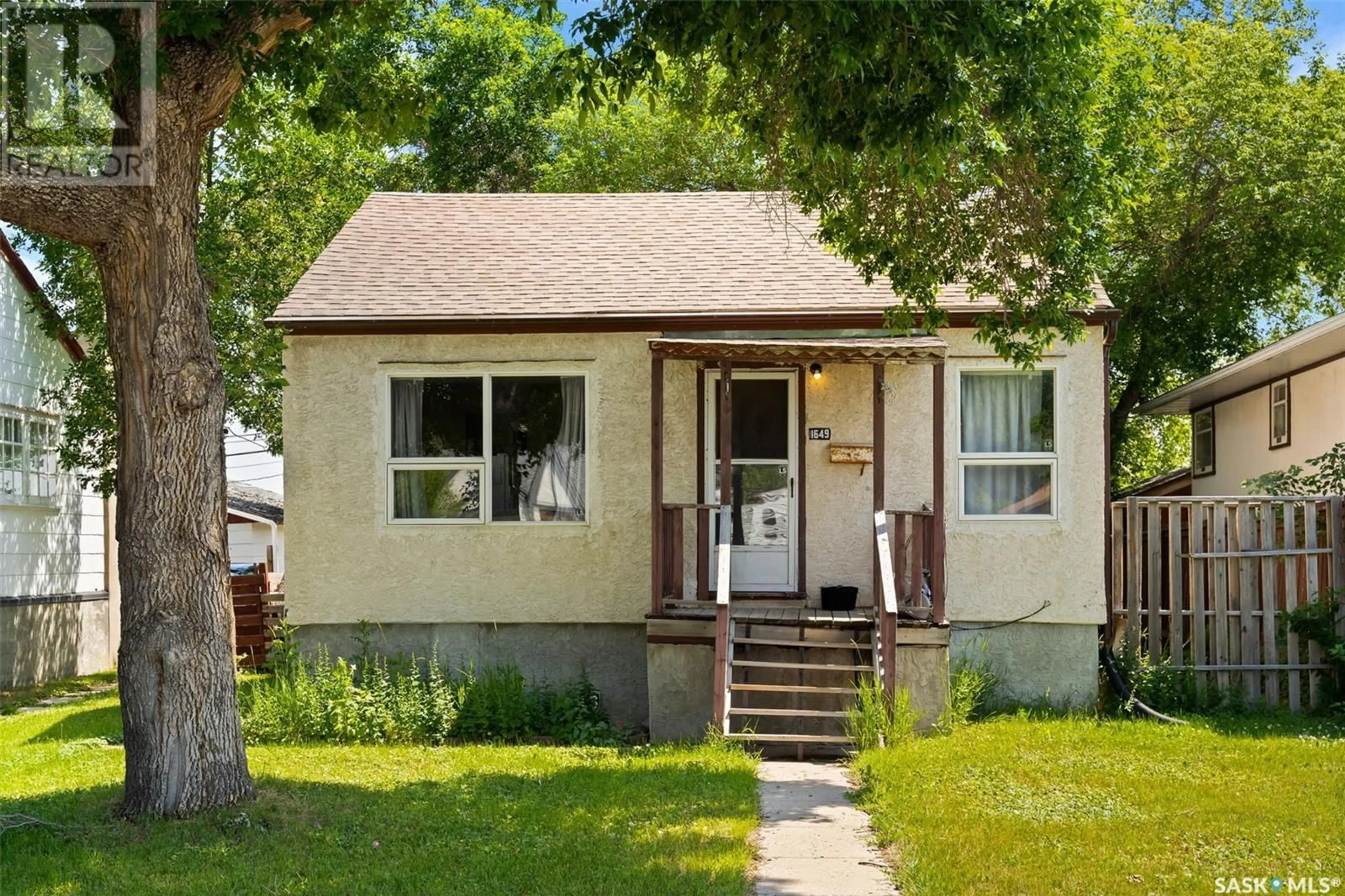 Home with vinyl exterior material, street for 1649 GARNET STREET, Regina Saskatchewan S4T2Z1