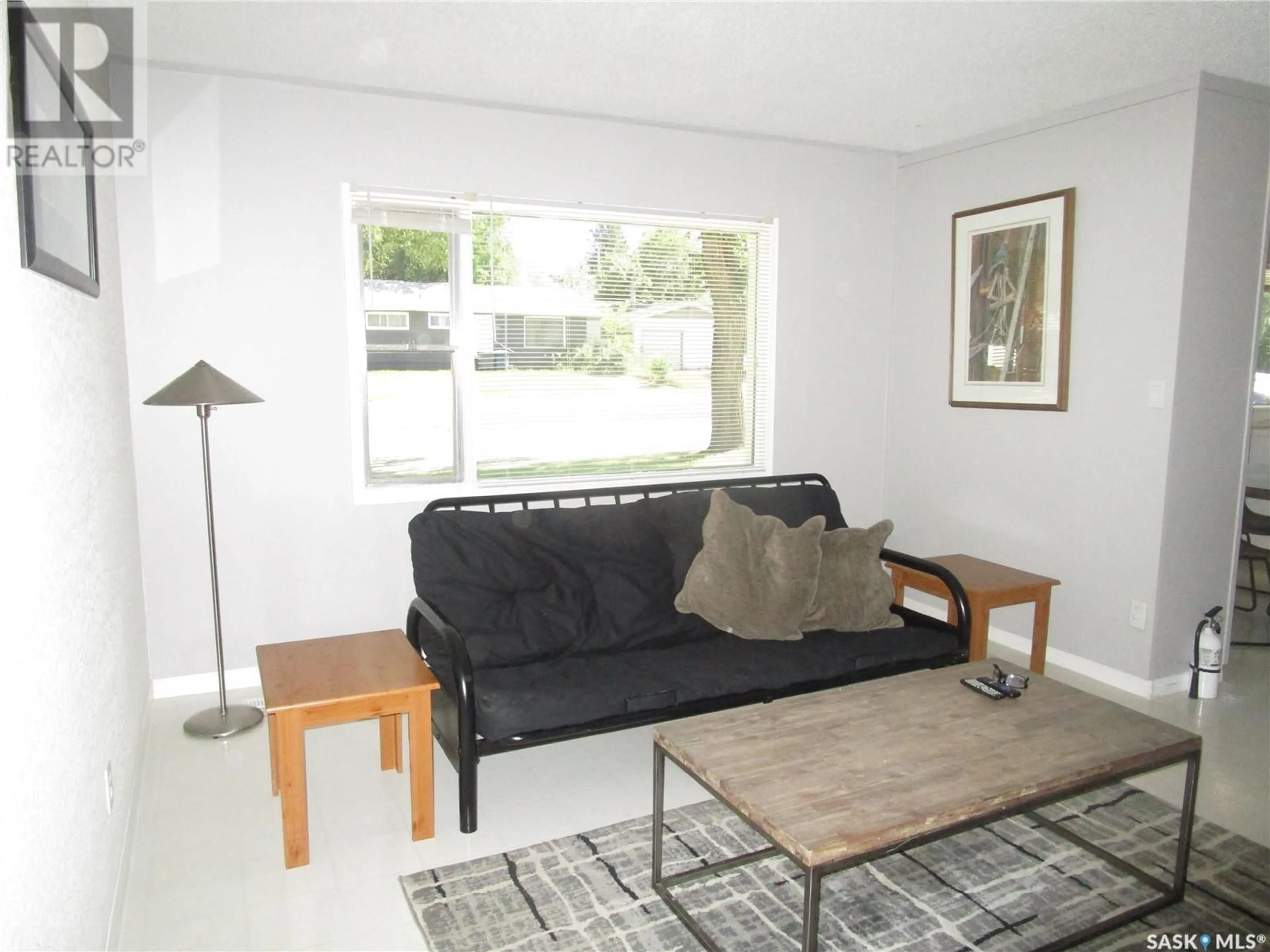 Living room with furniture, unknown for 308 DOMINION ROAD, Assiniboia Saskatchewan S0H0B0