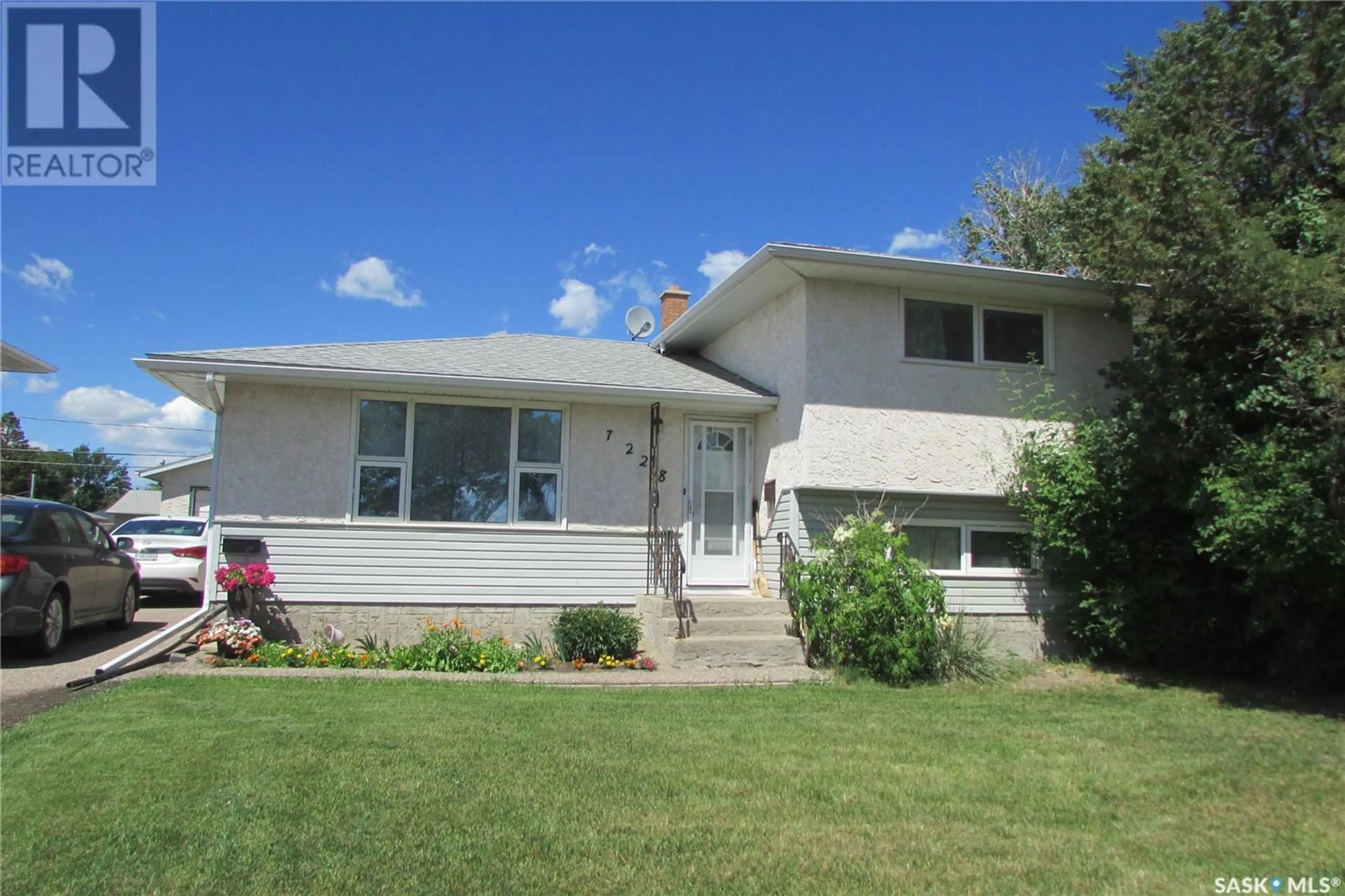Home with vinyl exterior material, street for 7228 DEWDNEY AVENUE, Regina Saskatchewan S4T1E6