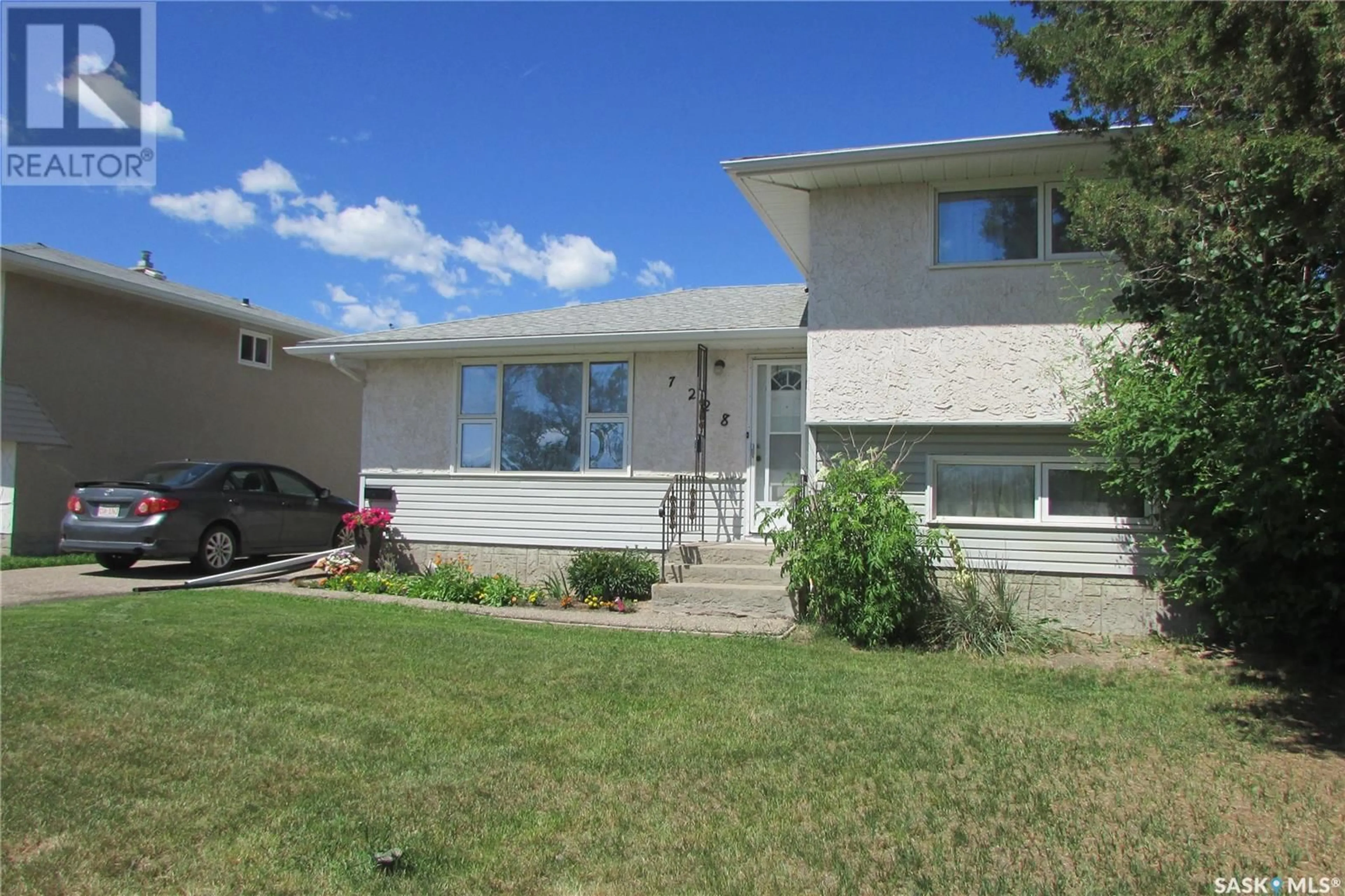 Home with vinyl exterior material, street for 7228 DEWDNEY AVENUE, Regina Saskatchewan S4T1E6