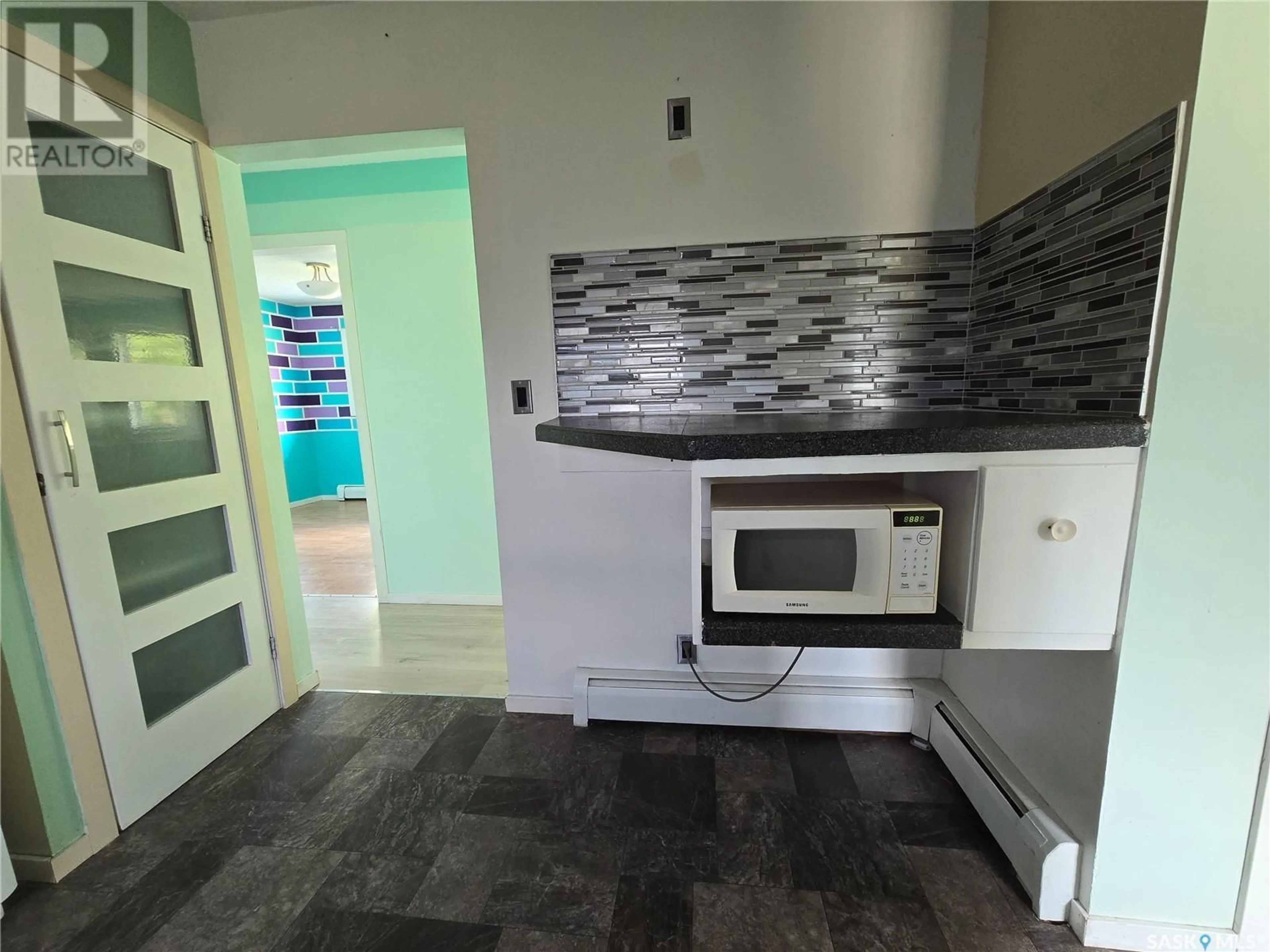 Open concept kitchen, ceramic/tile floor for 400 SULLIVAN STREET, Stoughton Saskatchewan S0G4T0