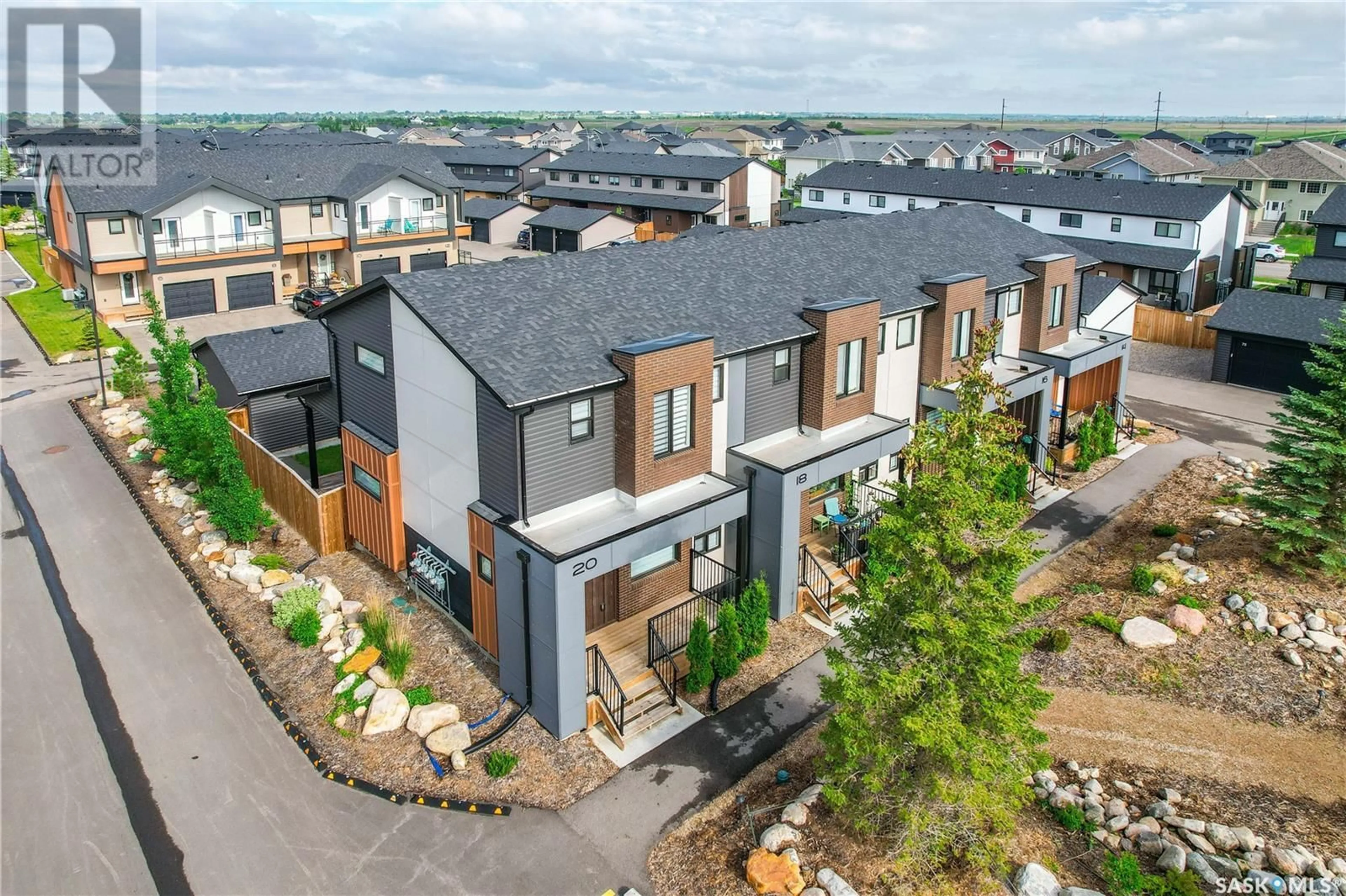 A pic from outside/outdoor area/front of a property/back of a property/a pic from drone, street for 20 619 EVERGREEN BOULEVARD, Saskatoon Saskatchewan S7W0Y7