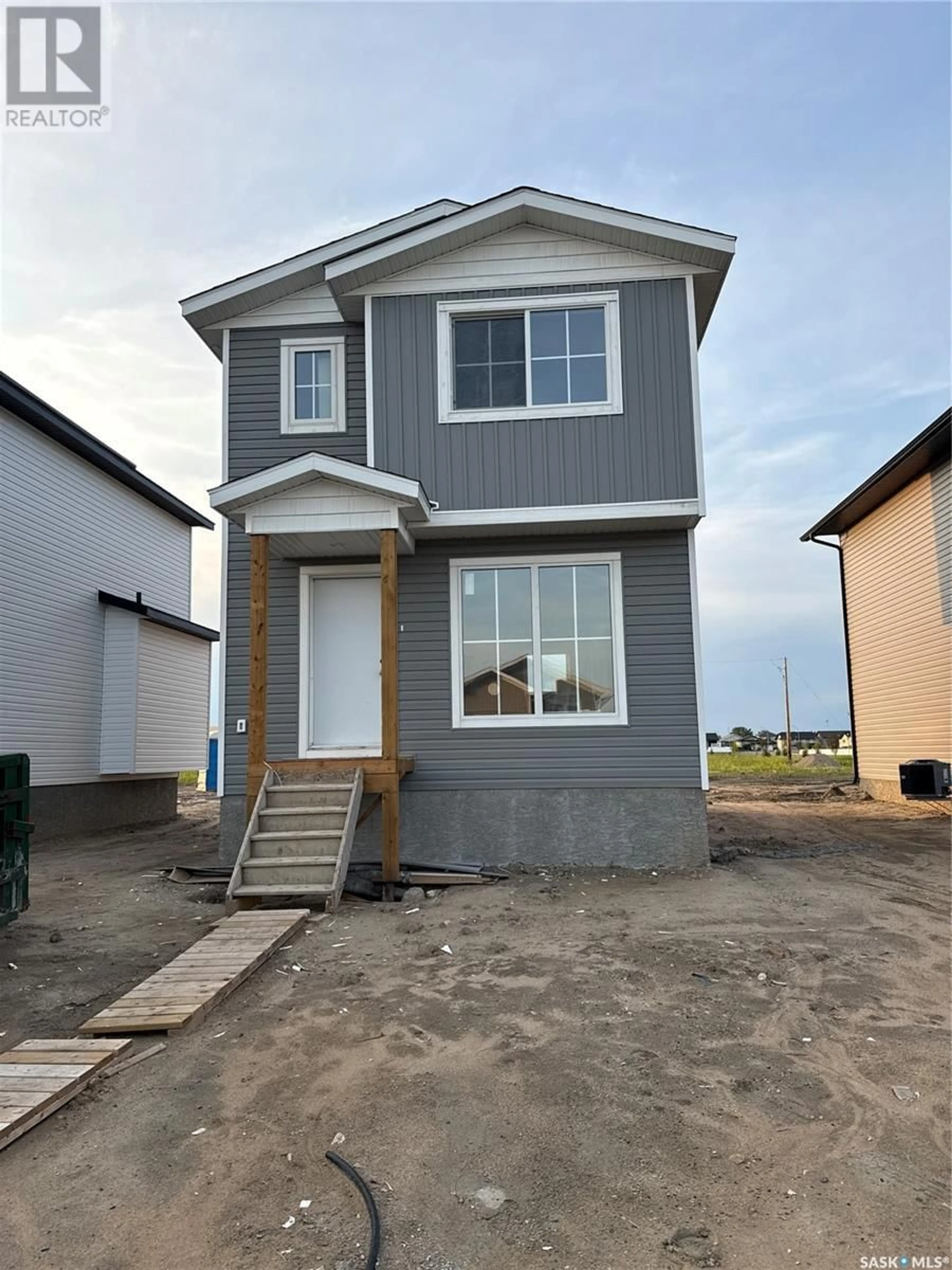 Home with vinyl exterior material, street for 408 ELDORADO STREET, Warman Saskatchewan S0K4S0