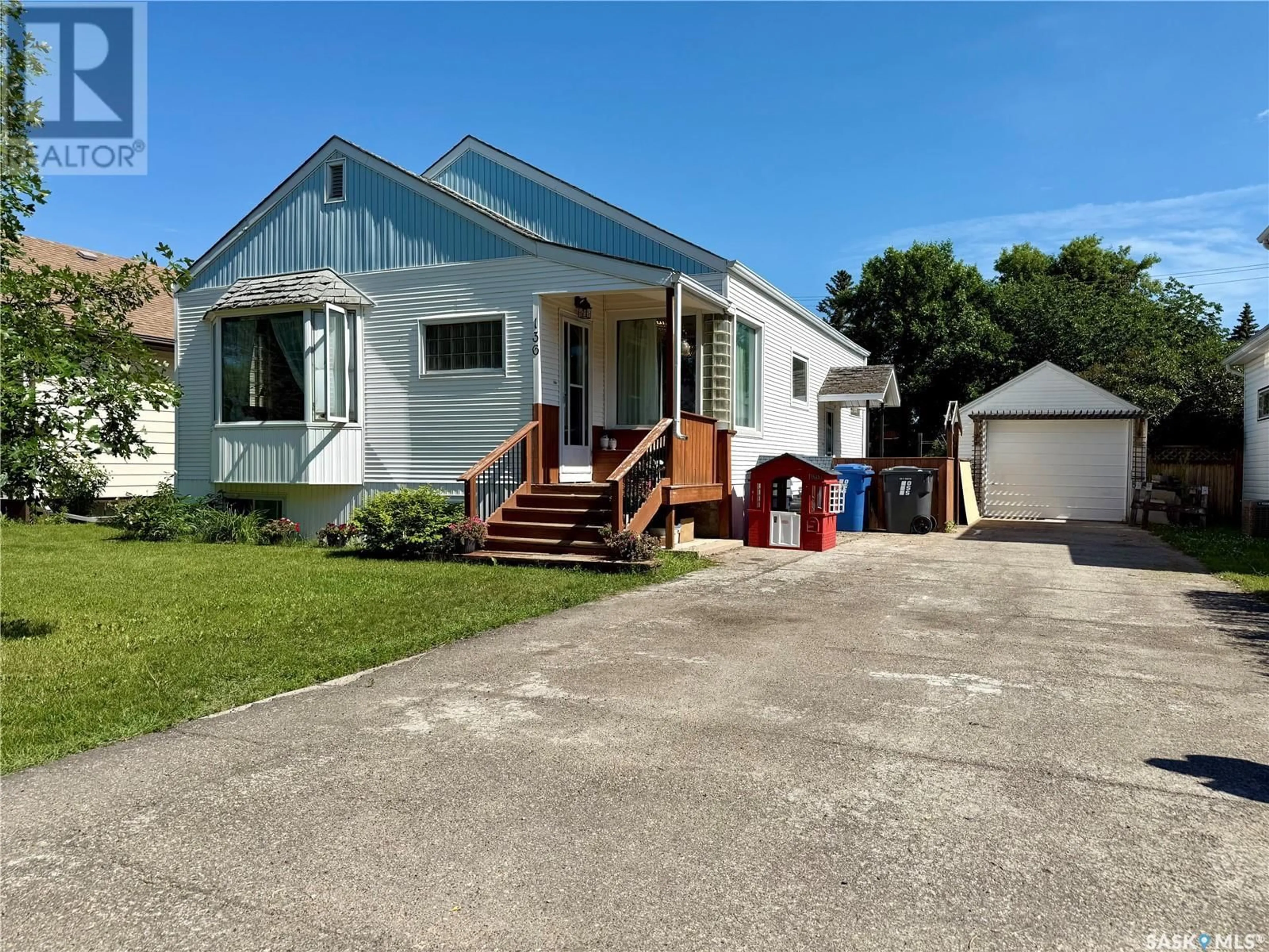 A pic from outside/outdoor area/front of a property/back of a property/a pic from drone, street for W - 136 EIGHTH AVENUE, Melville Saskatchewan S0A2P1